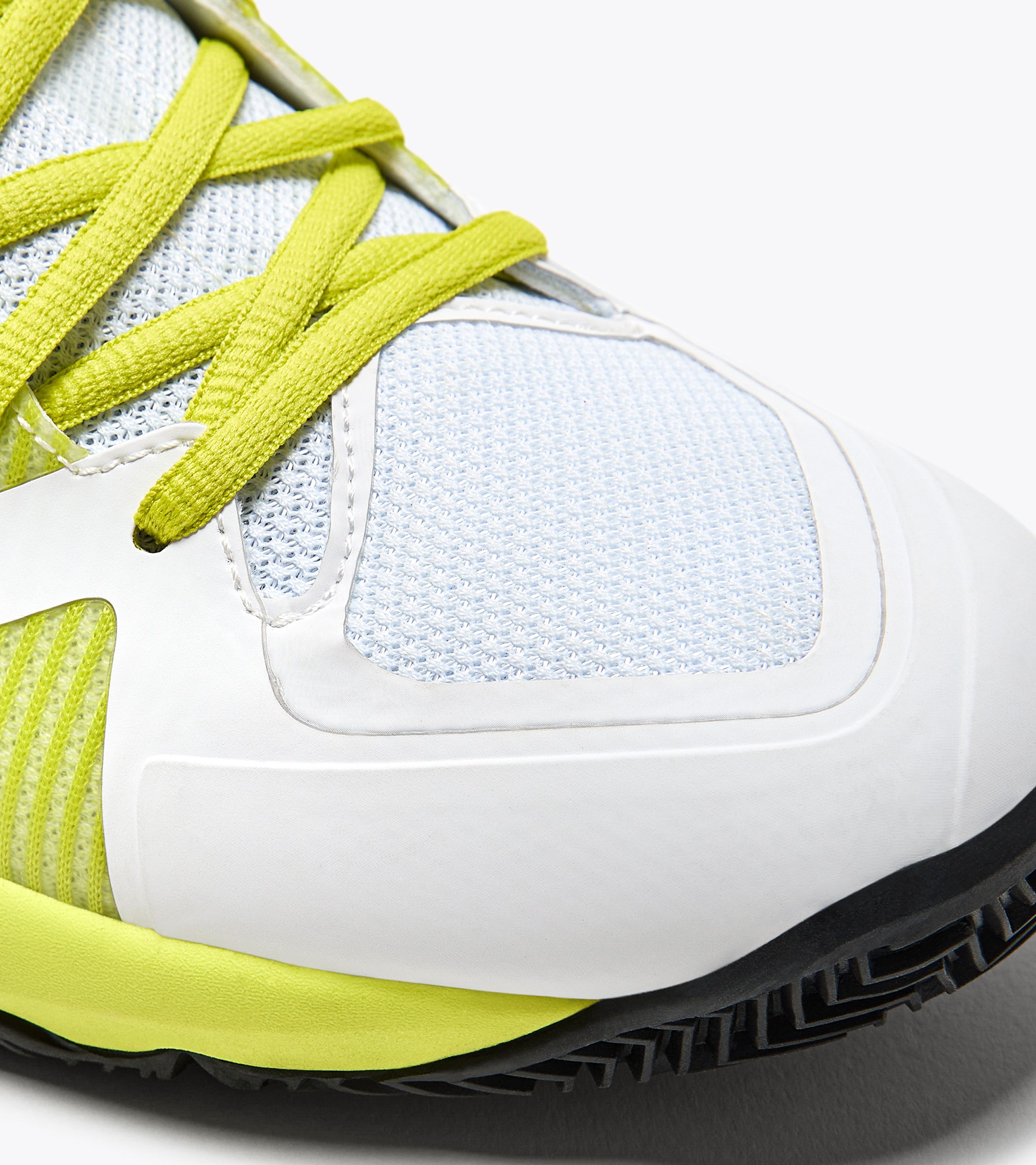 Yellow and white tennis shoes on sale