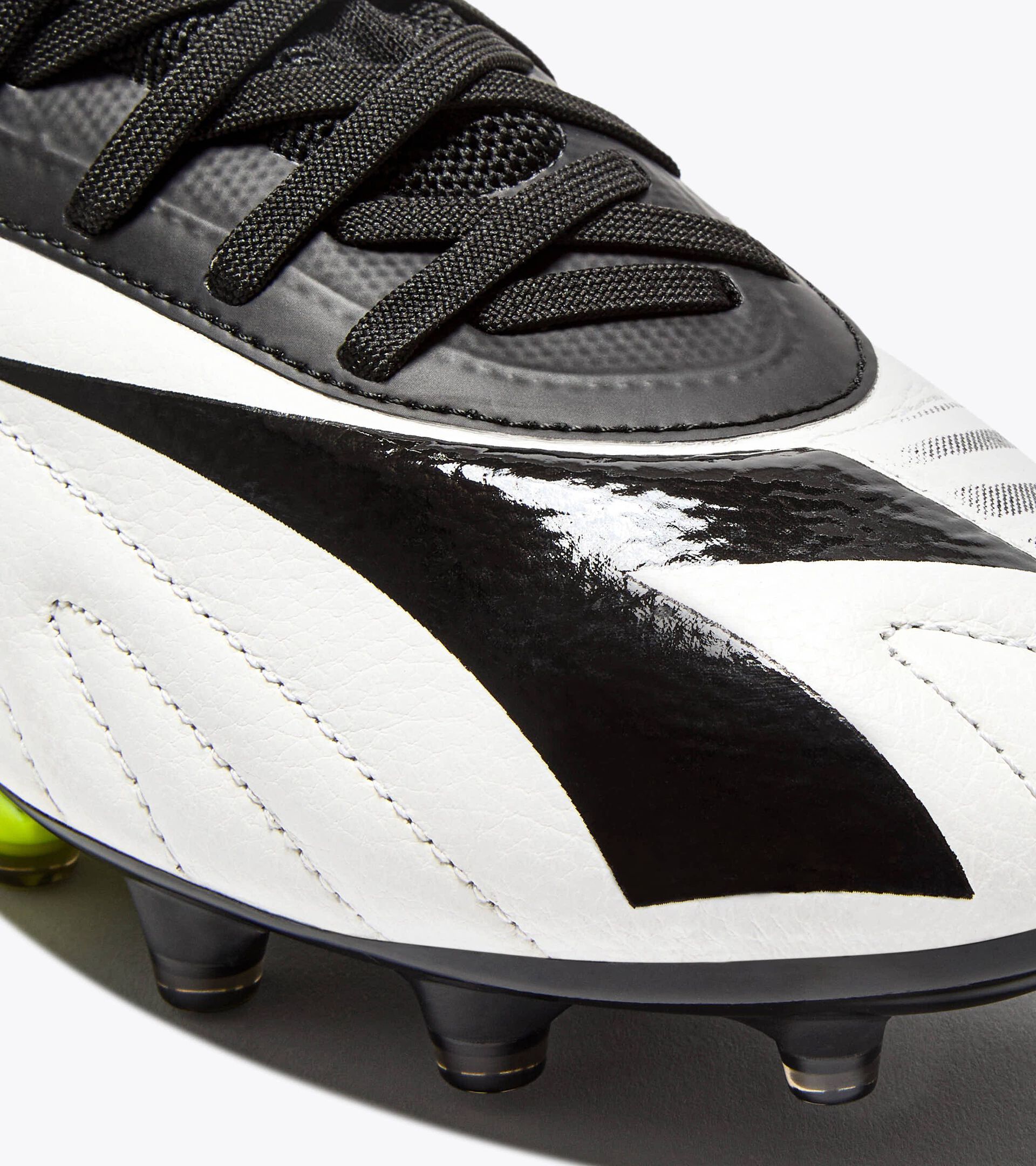 Leather calcio boots for firm grounds - All-gender
 MAXIMUS ICON SLX BLACK/WHITE/YELLOW FL DD - Diadora