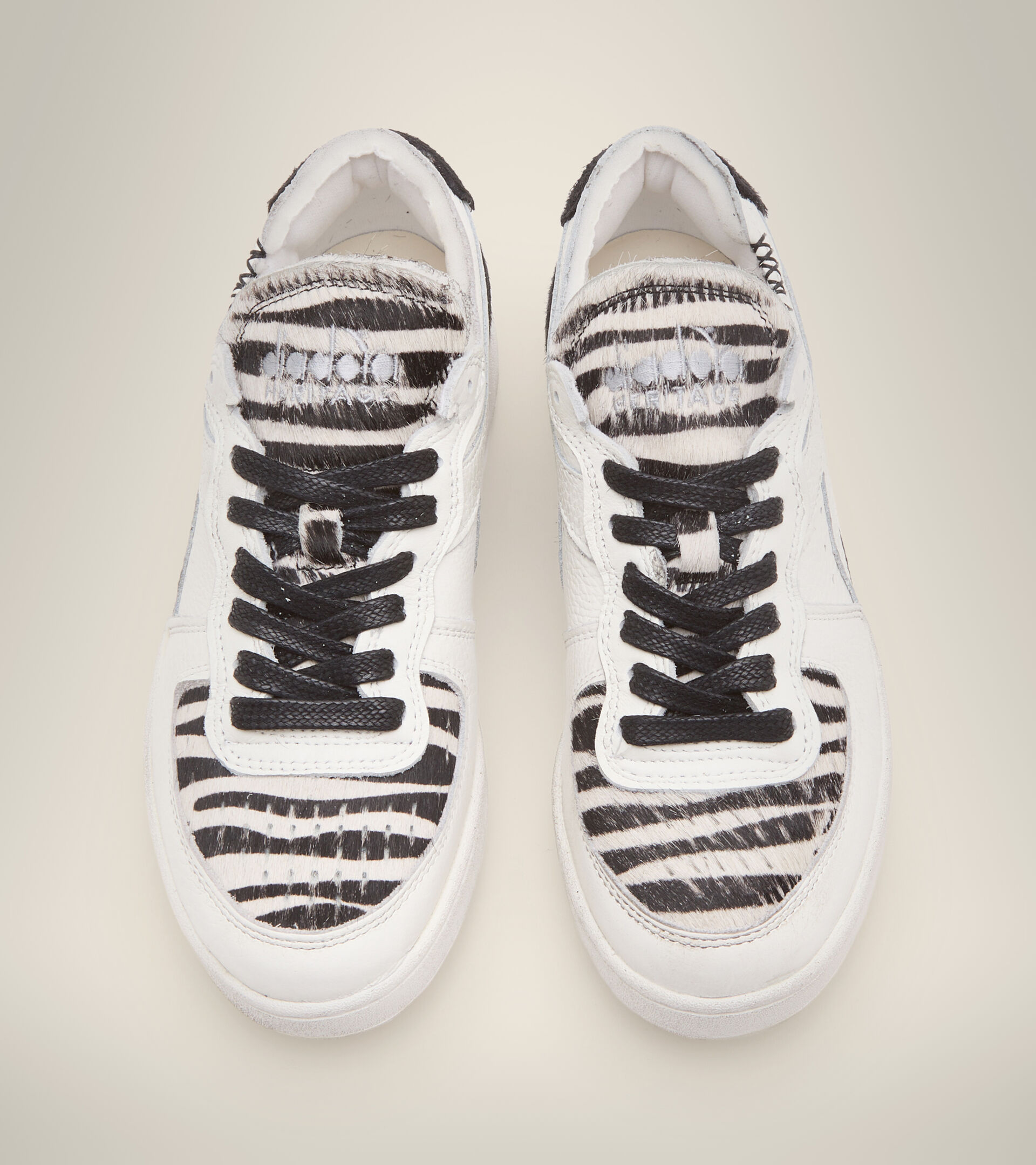 Footwear Heritage DONNA MI BASKET ROW CUT ZEBRA WN BLANCO/NEGRO Diadora