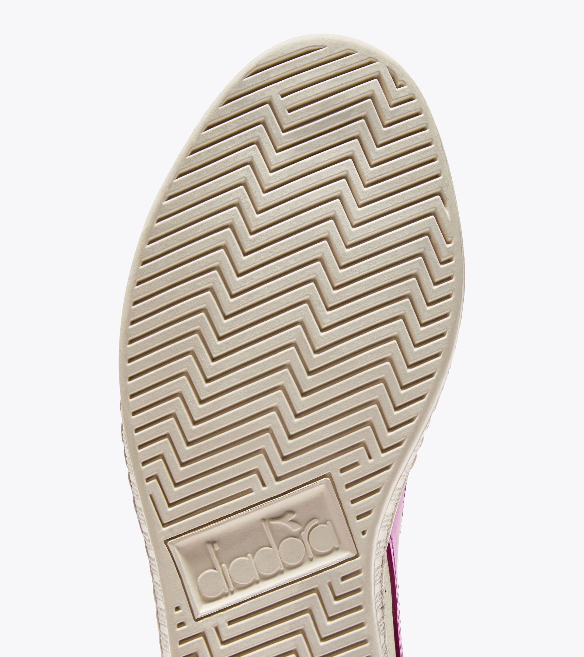 Leather sports sneakers - Women’s 
 GAME L LOW WAXED METAL WN WHITE/FESTIVAL FUCHSIA - Diadora