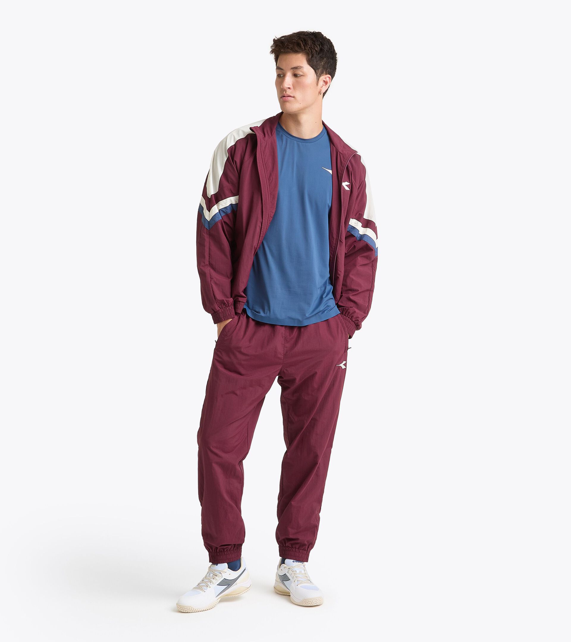 Surv&ecirc;tement de tennis en taslan - Comp&eacute;tition - Pour tous les genres U. TRACK PANTS MATCH ROUGE BANDEROLE - Diadora