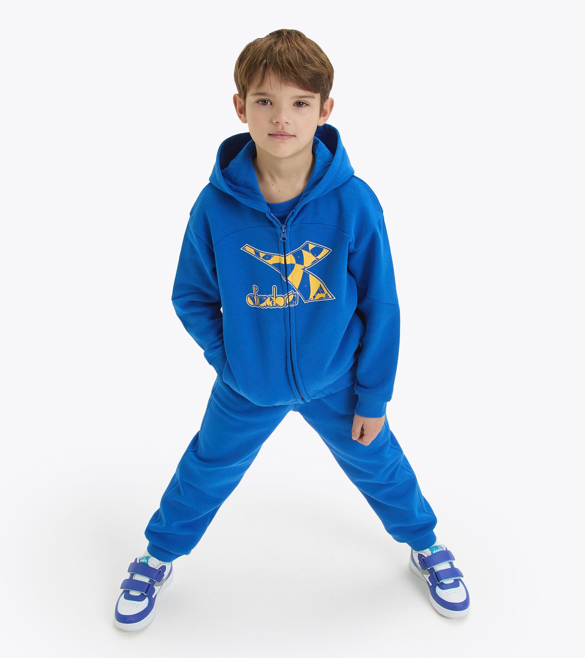 Trainingsanzug - Jungen
 JB. TRACKSUIT HD FZ RIDDLE PRINZESSIN BLAU - Diadora