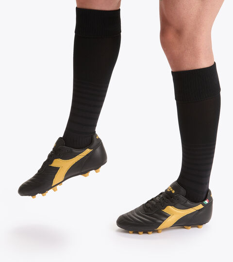 BRASIL LT+ MDPU, NOIR/OR BRUN Chaussures de football pour terrains compacts BRASIL LT+ MDPU NOIR/OR BRUN - Diadora