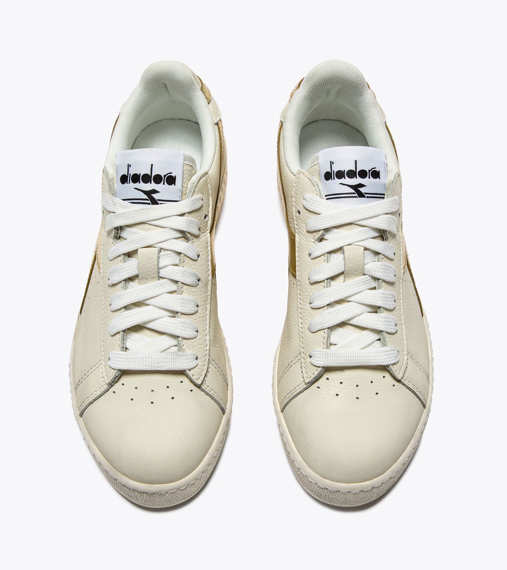Leather sports sneakers - Women&rsquo;s GAME L LOW WAXED METAL WN WHITE/GOLD - Diadora
