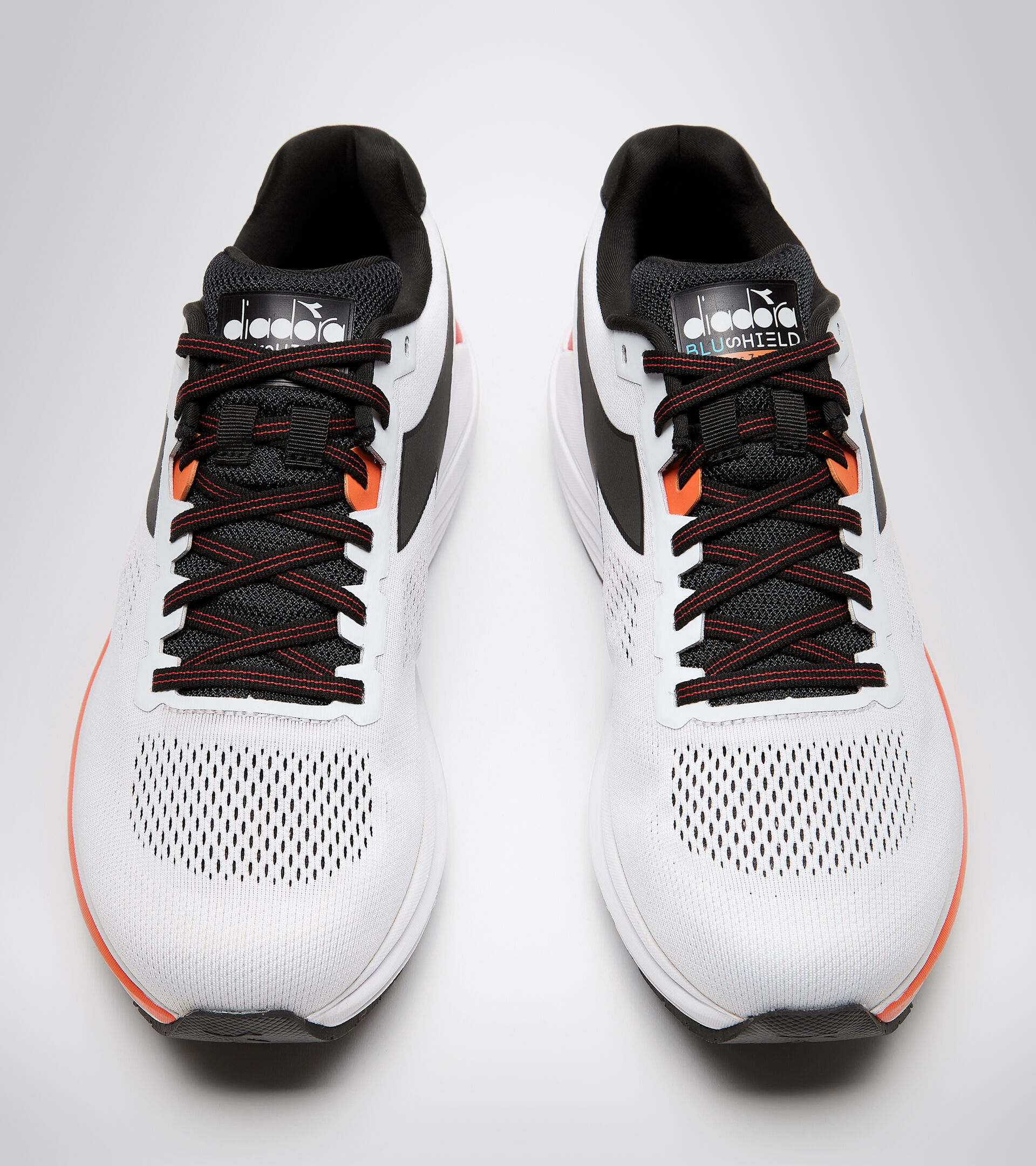 Running shoes - Men MYTHOS BLUSHIELD 7 VORTICE WHITE/BLACK/VERMILLION ORANGE - Diadora