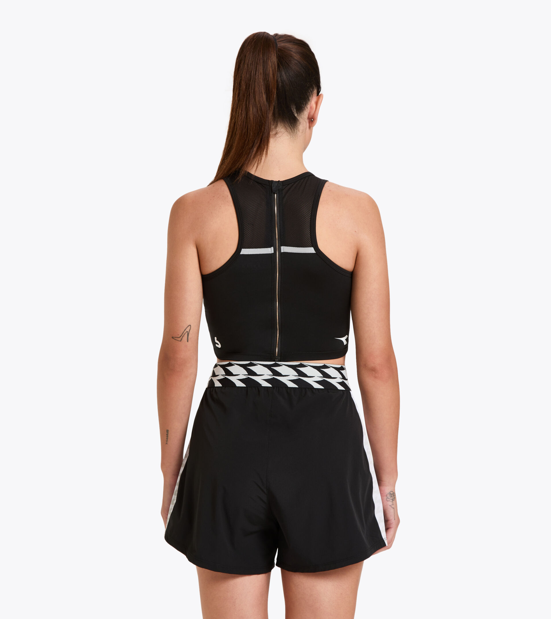 Training tank top - Women L. SNUG CROP TOP BUDDYFIT BLACK - Diadora
