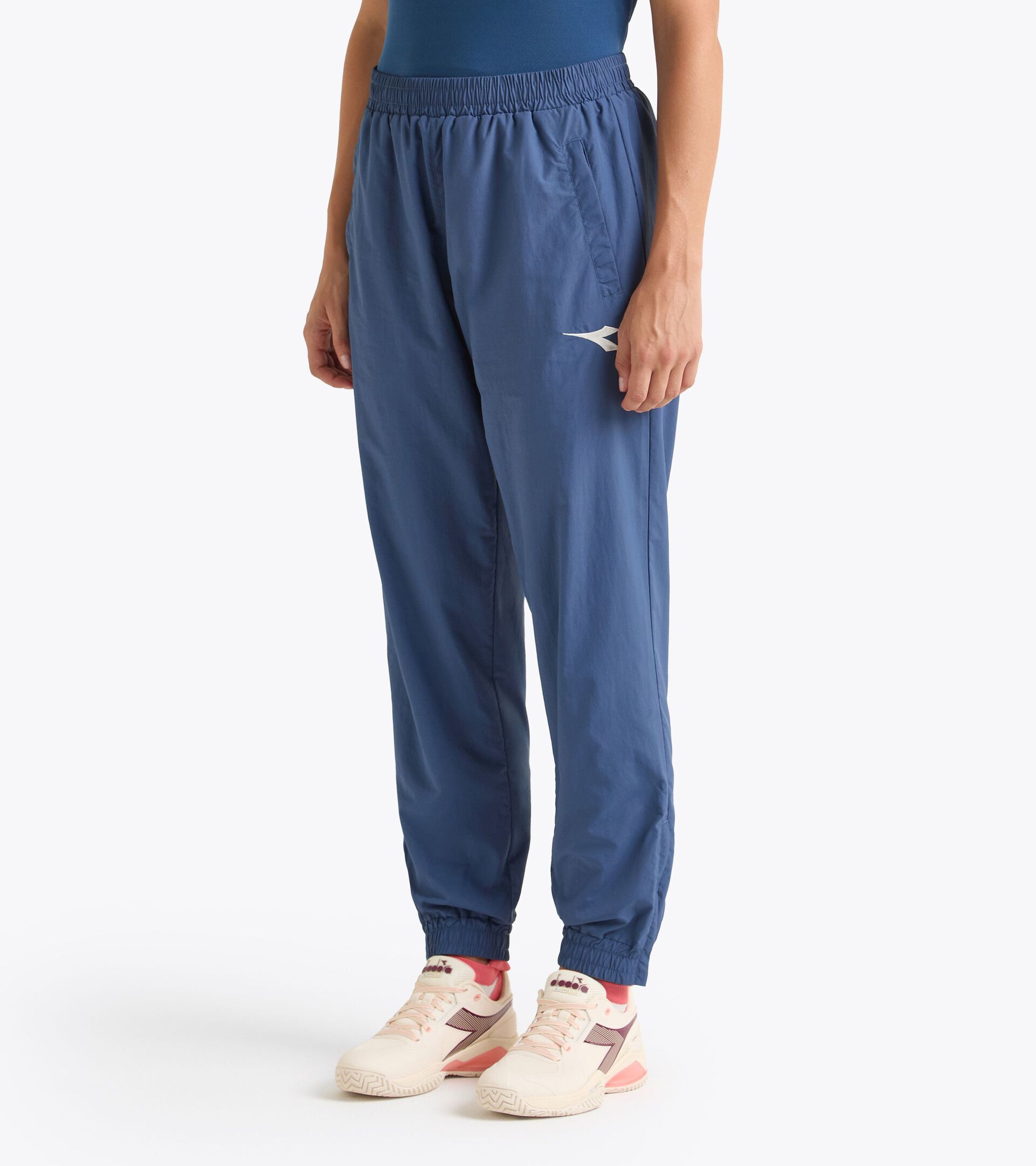 Surv&ecirc;tement de tennis en taslan - Comp&eacute;tition - Pour tous les genres U. TRACK PANTS MATCH BLEU INSIGNES - Diadora