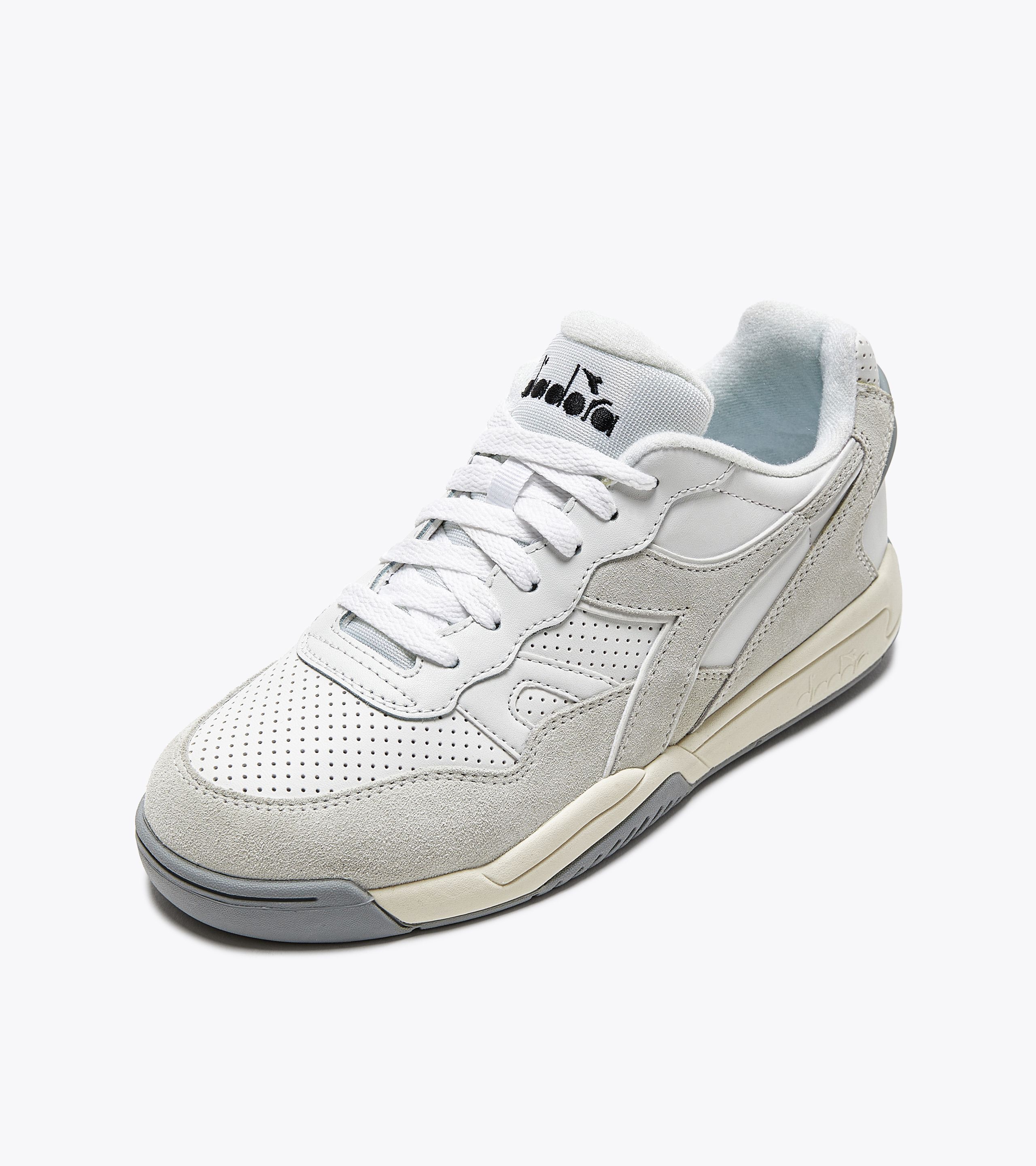 White diadora top shoes