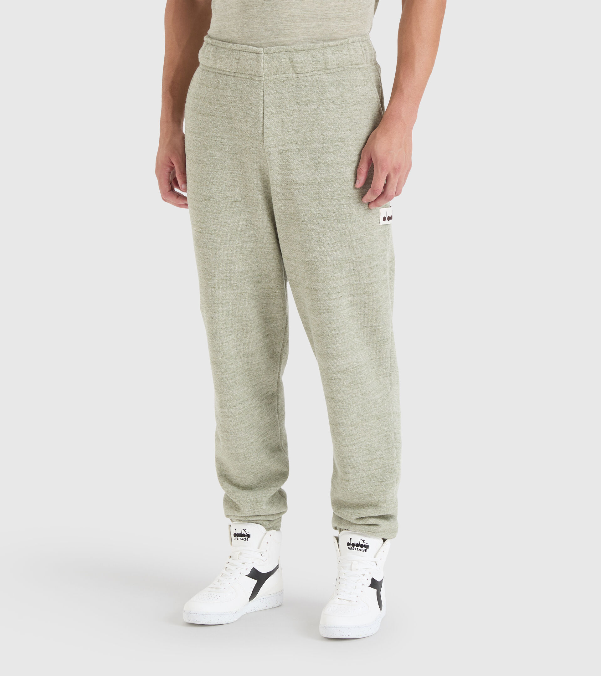 Pantalon de sport - Unisexe PANT MANIFESTO 2030 MELANGE VERT DESERT SAUGE - Diadora