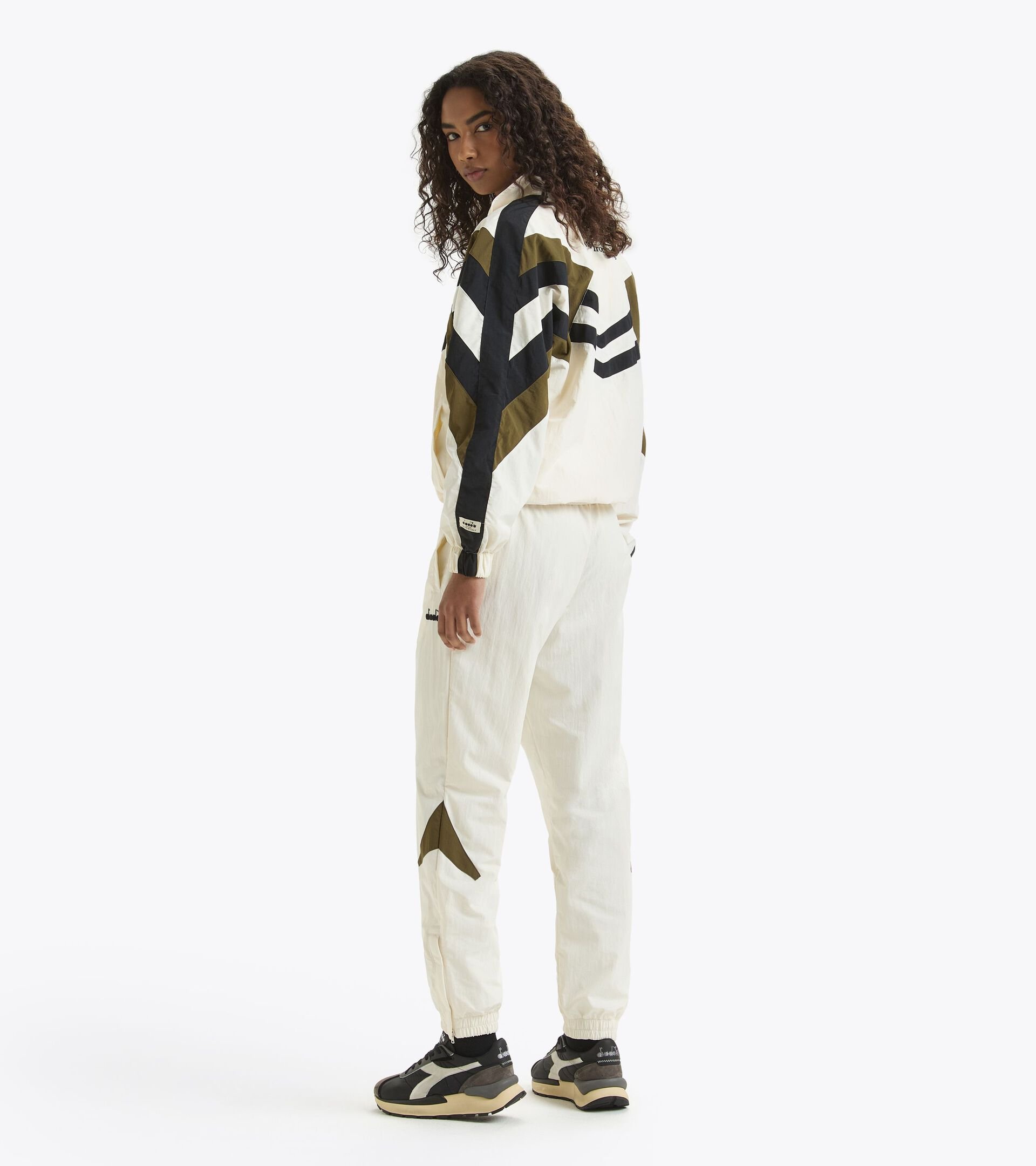 Sporthose - made in Italy - genderneutral TRACK PANTS LEGACY WISPERN WEISS - Diadora