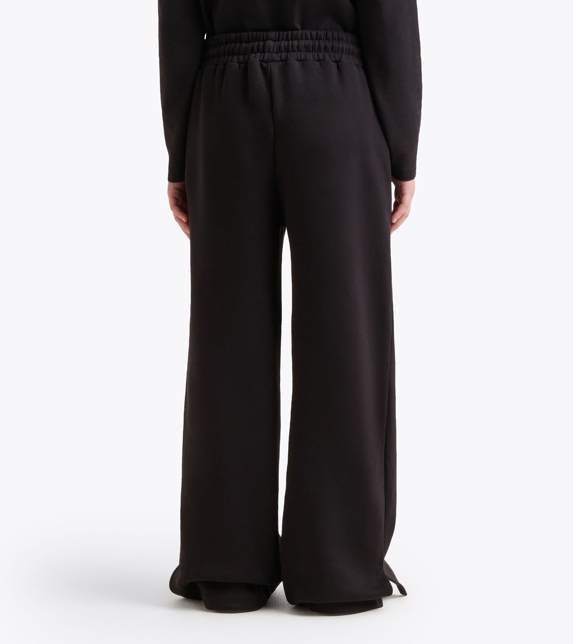 Sporthose mit ausgestelltem Bein - Mädchen JG. FLARE PANTS RHINESTONE SCHWARZ - Diadora