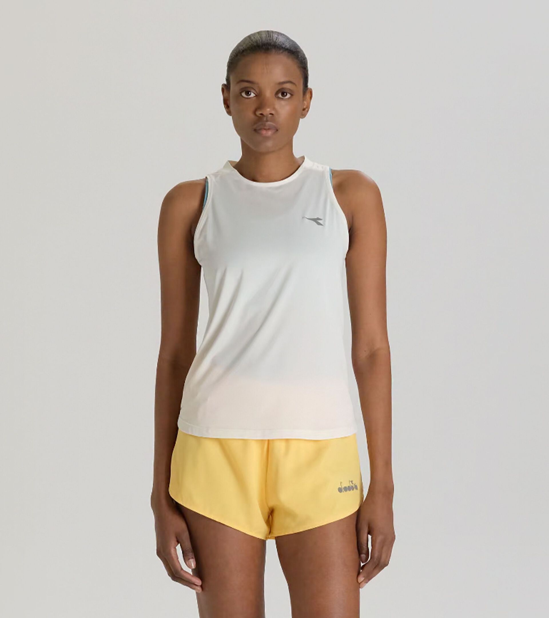 Camiseta sin mangas de running - Tejido ligero - Mujer
 L. SUPER LIGHT TANK BLANCO MURMURAR - Diadora