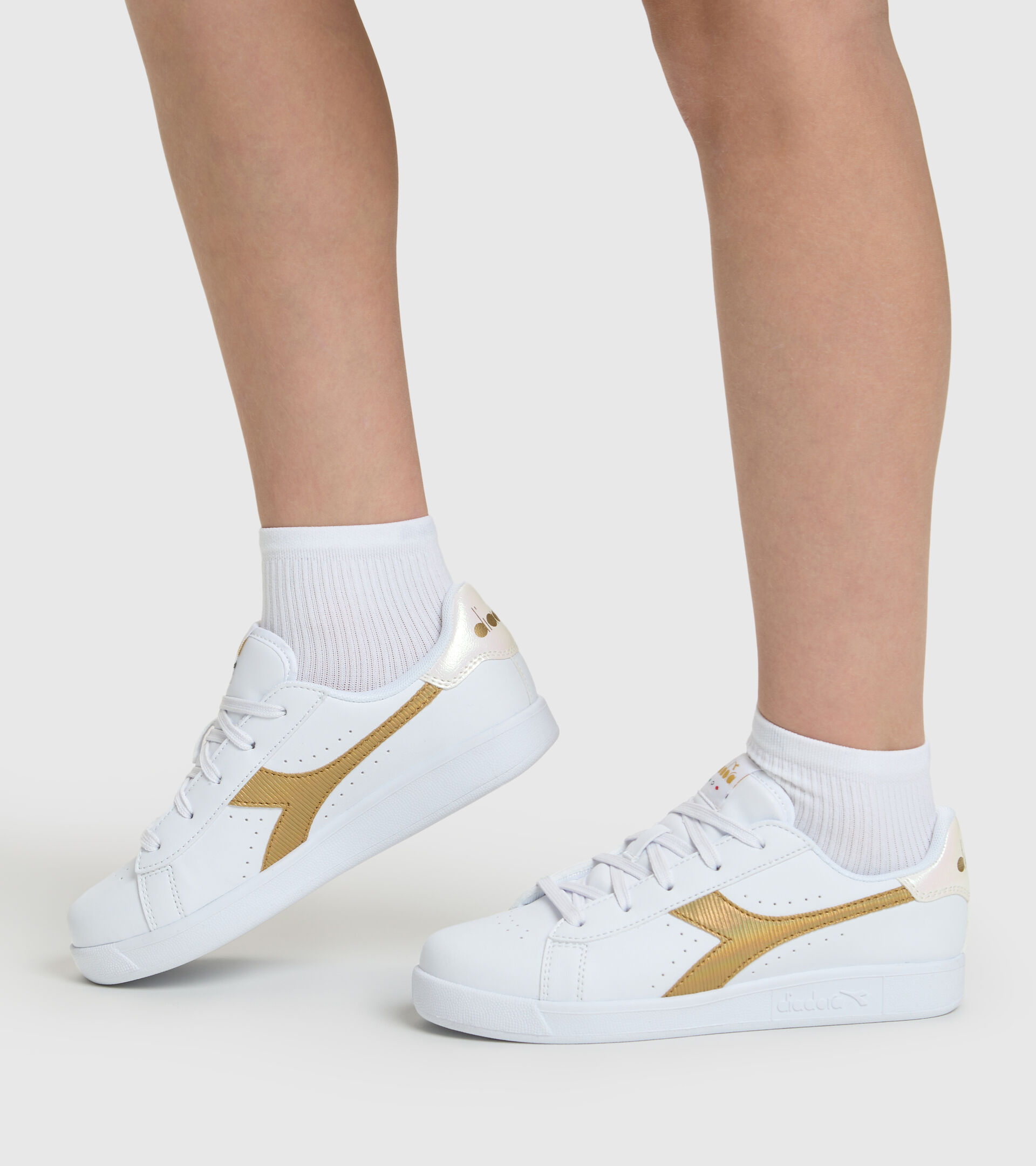 Sports shoes - Youth 8-16 years GAME P GS GIRL WHITE/GOLD - Diadora