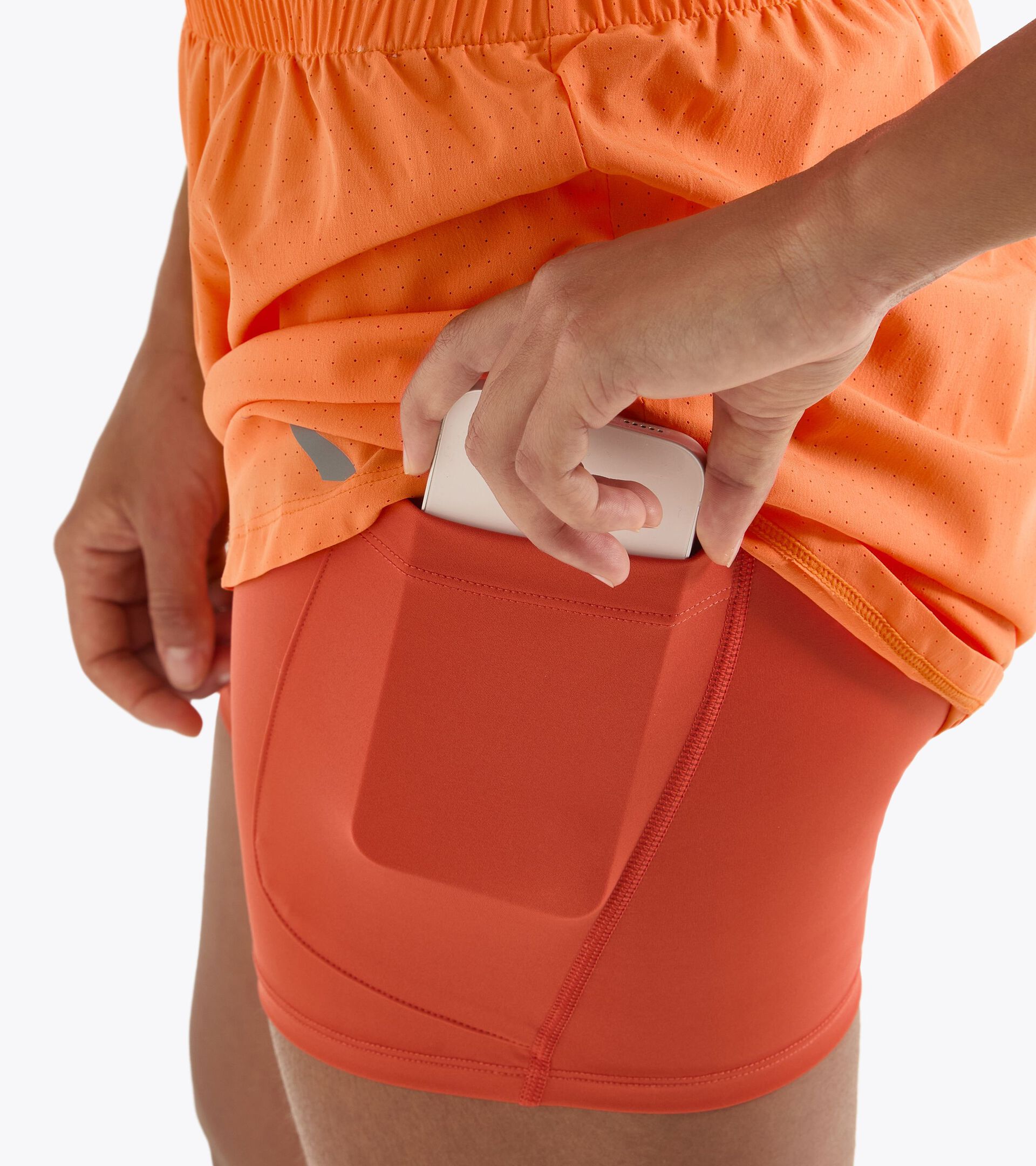 Pantaloncini da corsa 2 in 1 - Allenamento - Donna
 L. SHORTS 2IN1 5 RUN CREW ARANCIO NETTARINA - Diadora