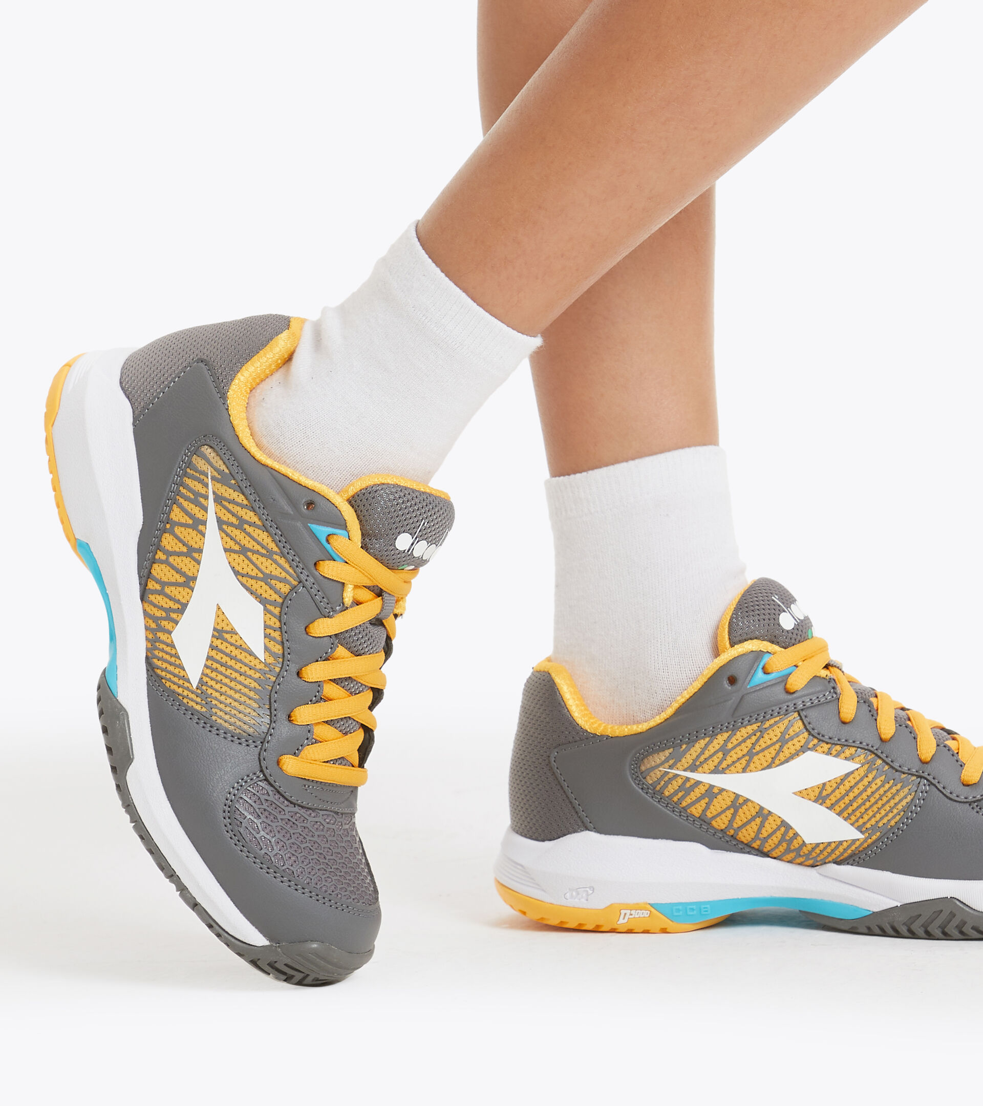 Tennisschuh für harte Böden und Sandplätze - Unisex Kind SPEED COMPETITION 2+ Y RUHIG SCHATTENGR/WSS/SAFRONGLB - Diadora