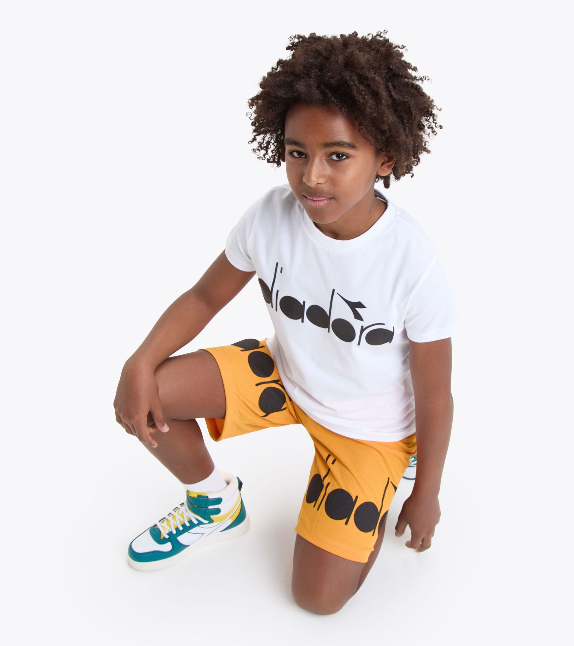 Bermudashorts - Gender neutral JU.BERMUDA LOGO WAERME APRIKOSE - Diadora