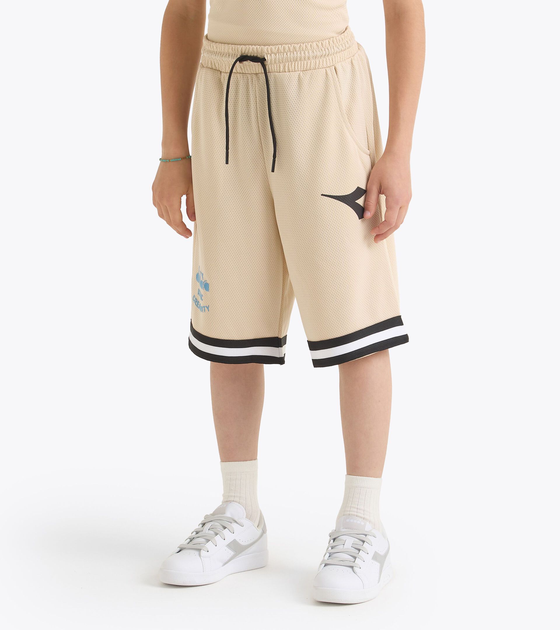 Bermuda - Fit comfort - Boy
JB. BERMUDA BSKT BALL SAND - Diadora