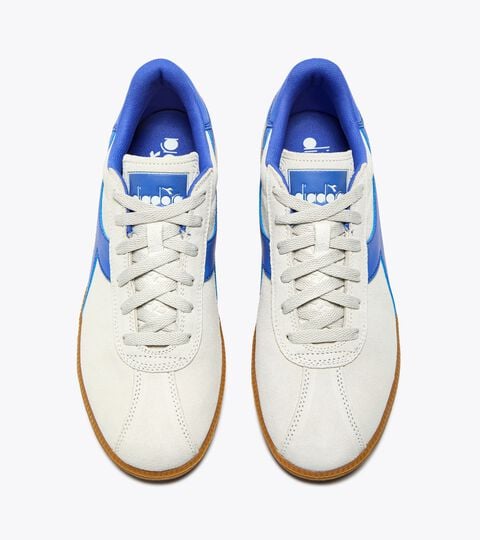 Zapatilla de piel - Para todos los géneros
 TOKYO BLANCO/AZUL AMPARO - Diadora