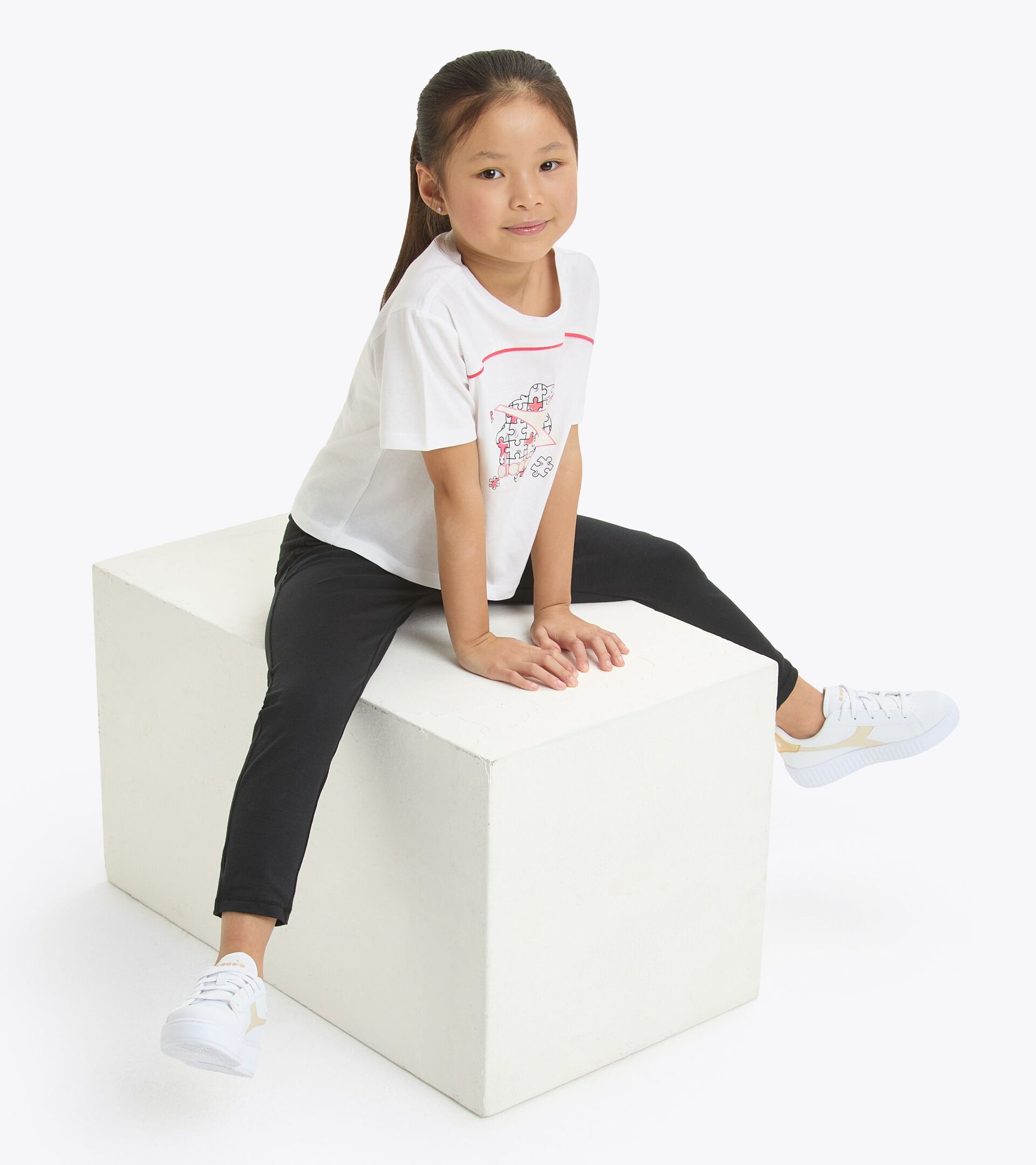 T-shirt - Ragazza
 JG. T-SHIRT SS PUZZLES BIANCO OTTICO - Diadora