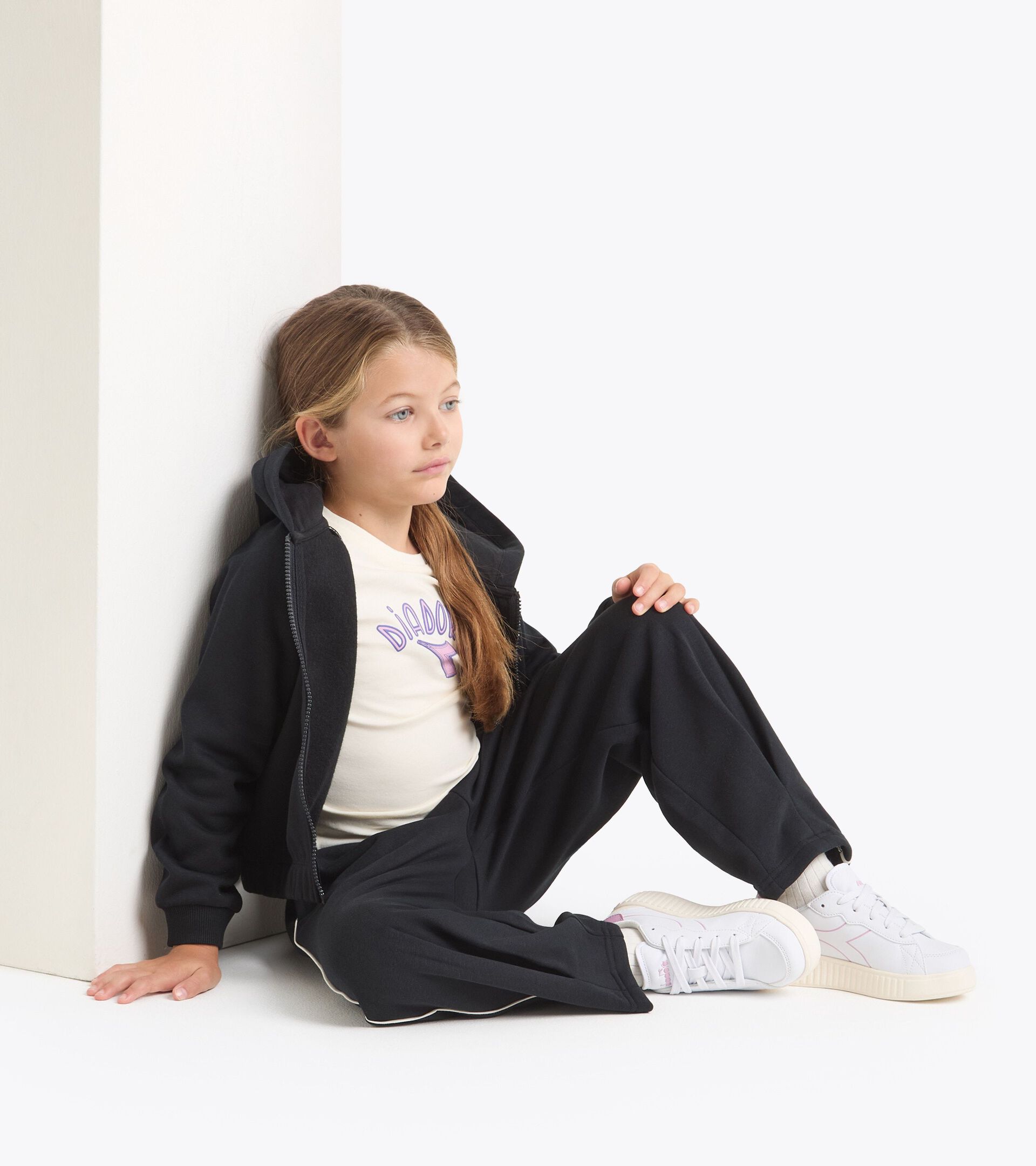 Conjunto de chándal - Niña/Adolescente
 JG. TRACKSUIT HD FZ LOGO (BR) NEGRO - Diadora