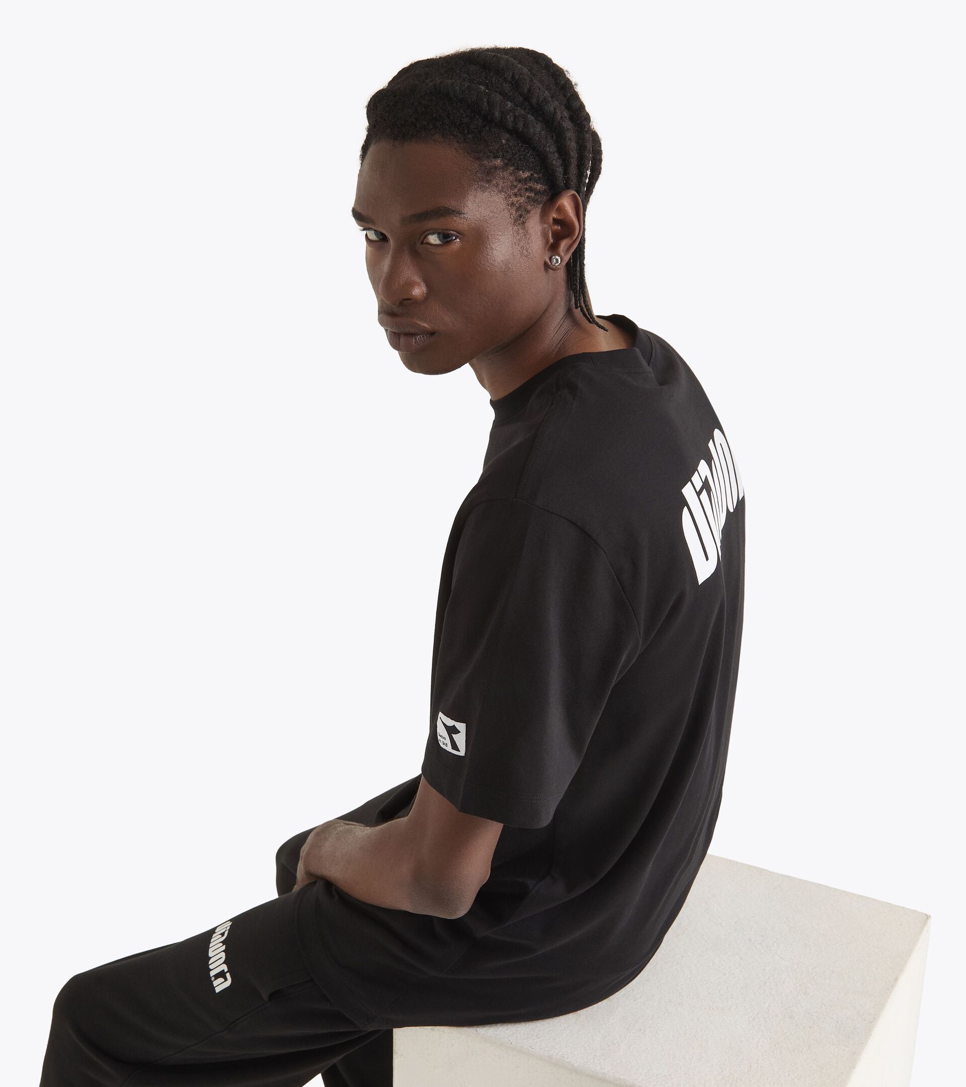 Camiseta de algodón - Para todos los géneros
T-SHIRT SS ATHL. LOGO SL NEGRO - Diadora