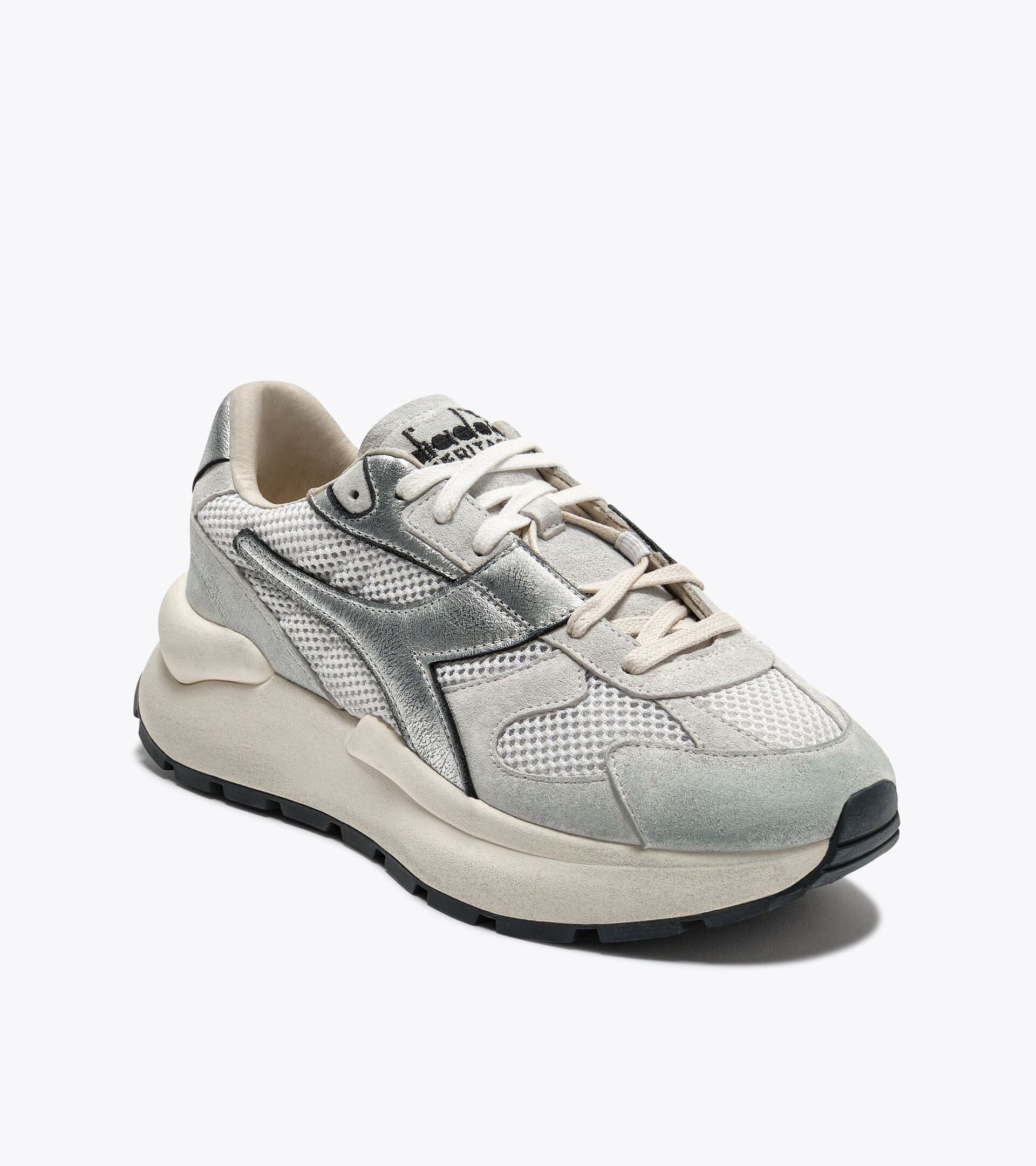 Zapatilla Heritage de piel y malla  - Mujer
 MERCURY ELITE METAL USED WN BLANCO - Diadora