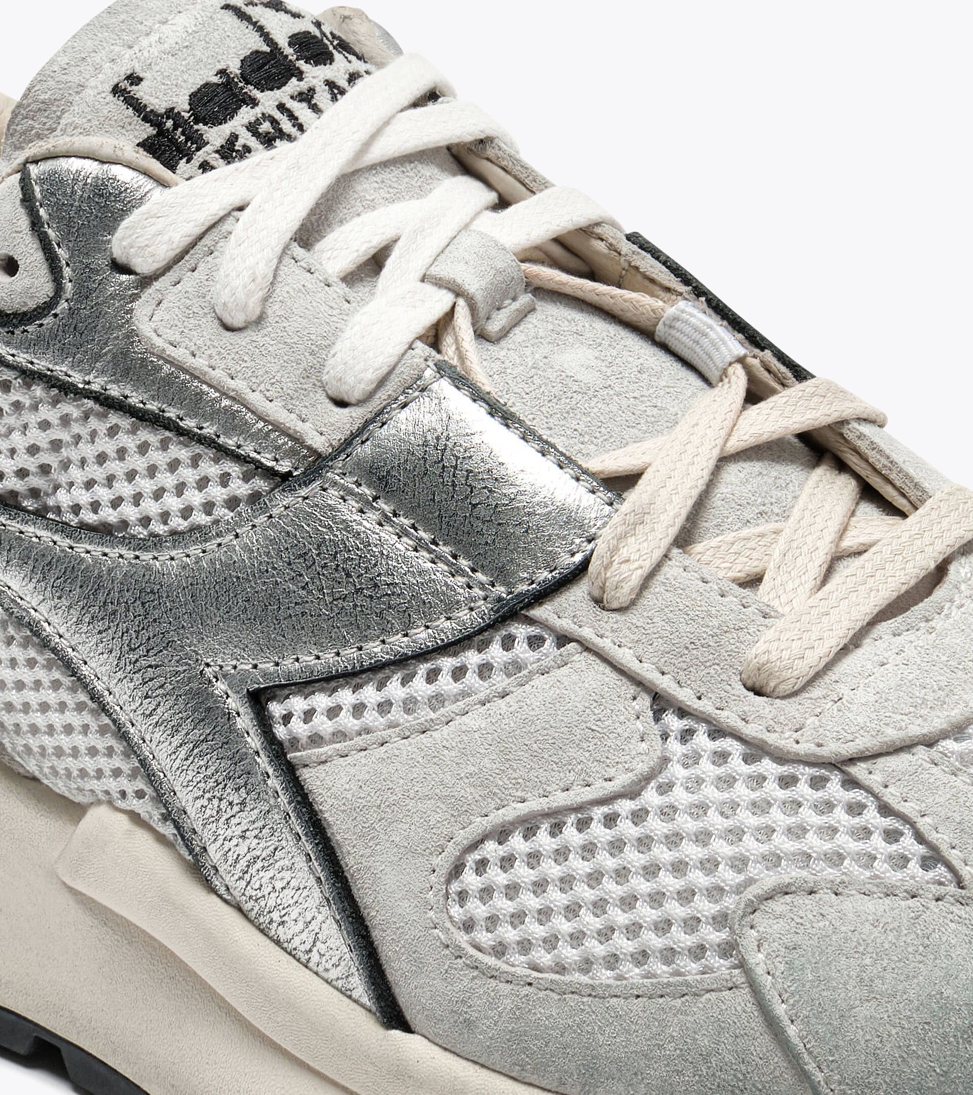 Zapatilla Heritage de piel y malla  - Mujer
 MERCURY ELITE METAL USED WN BLANCO - Diadora