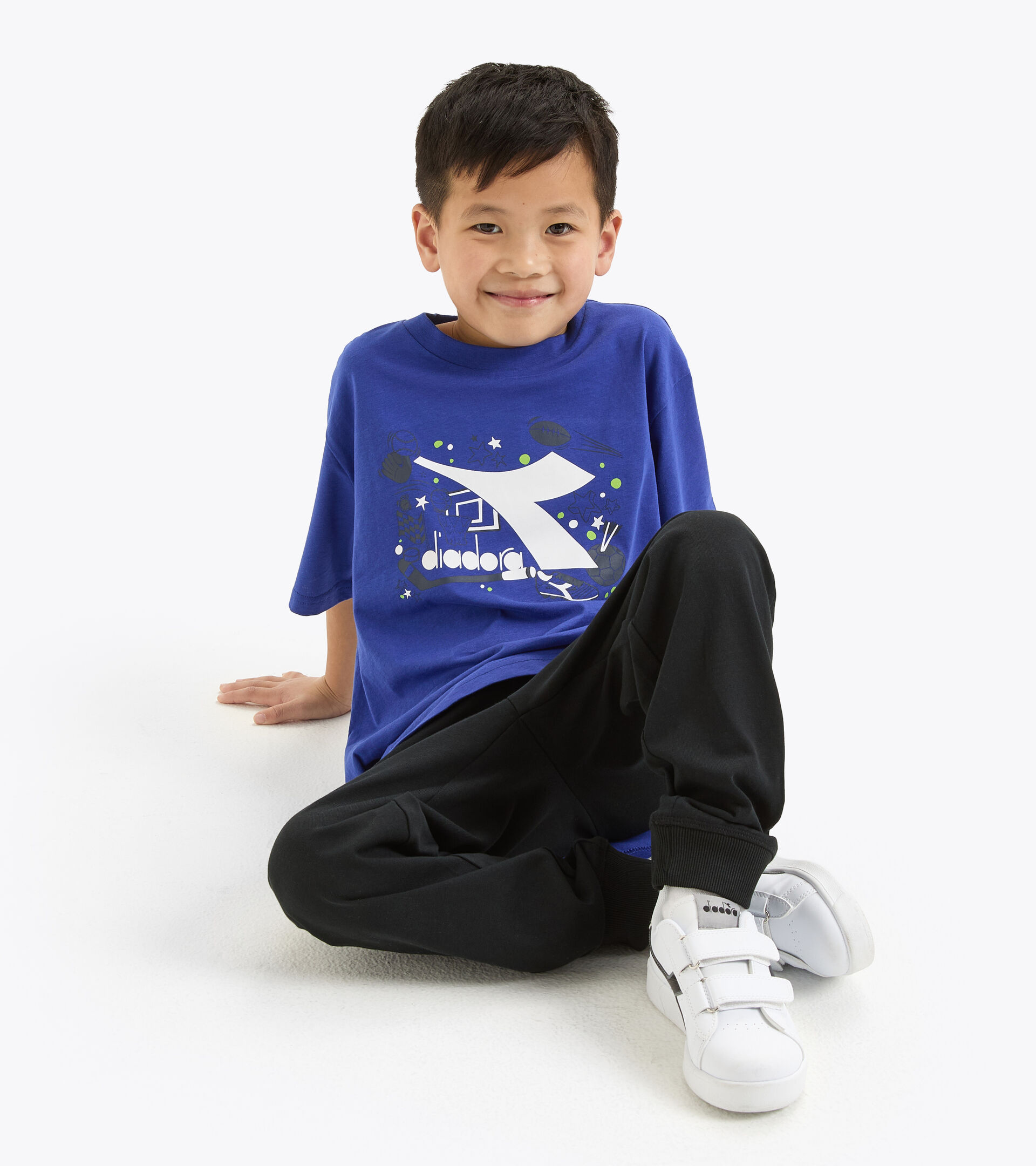 Camiseta deportiva - Niño JB. T-SHIRT SS NEON AZUL NAVEGAR EN LA WEB - Diadora