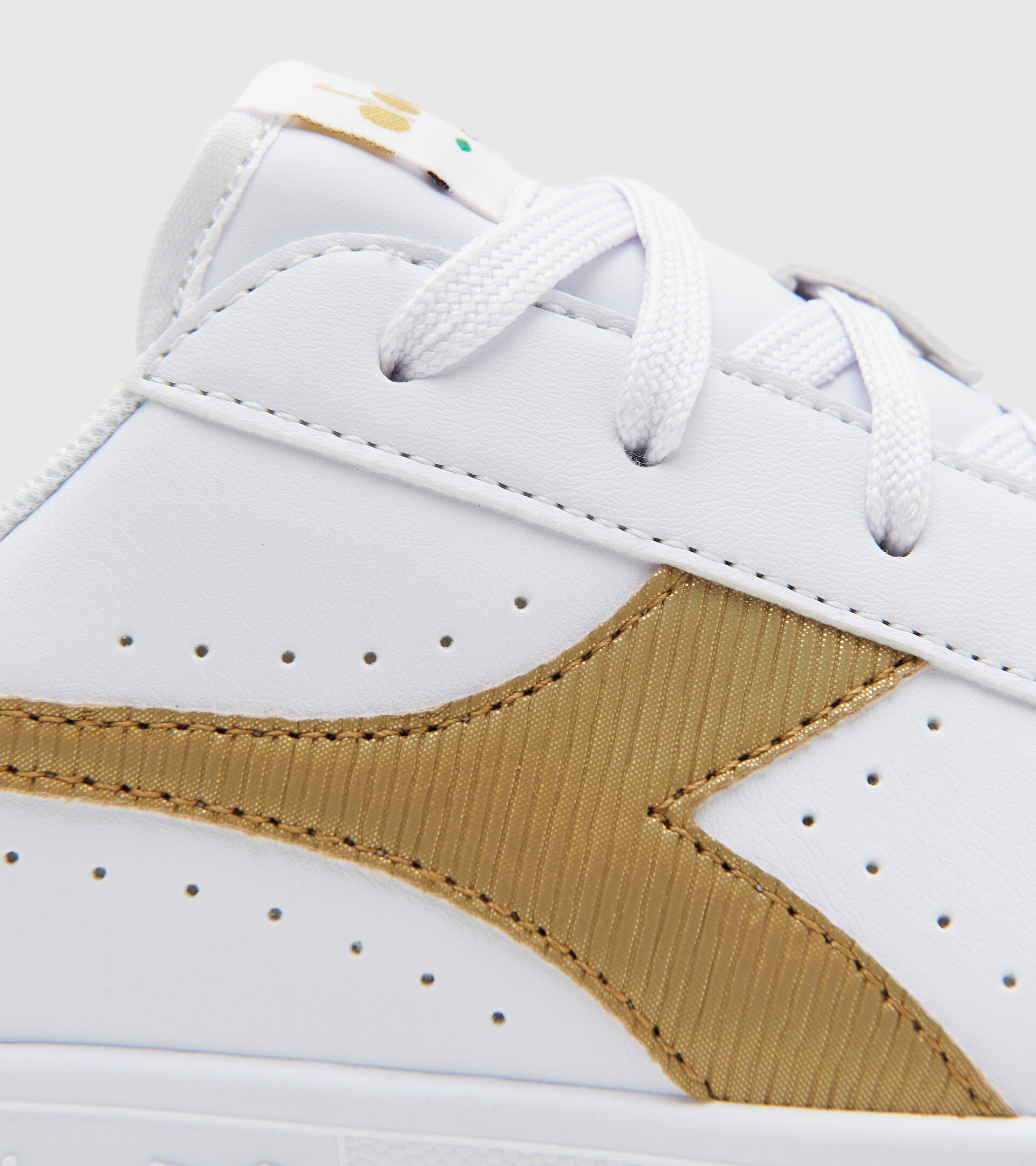 Sports shoes - Youth 8-16 years GAME P GS GIRL WHITE/GOLD - Diadora