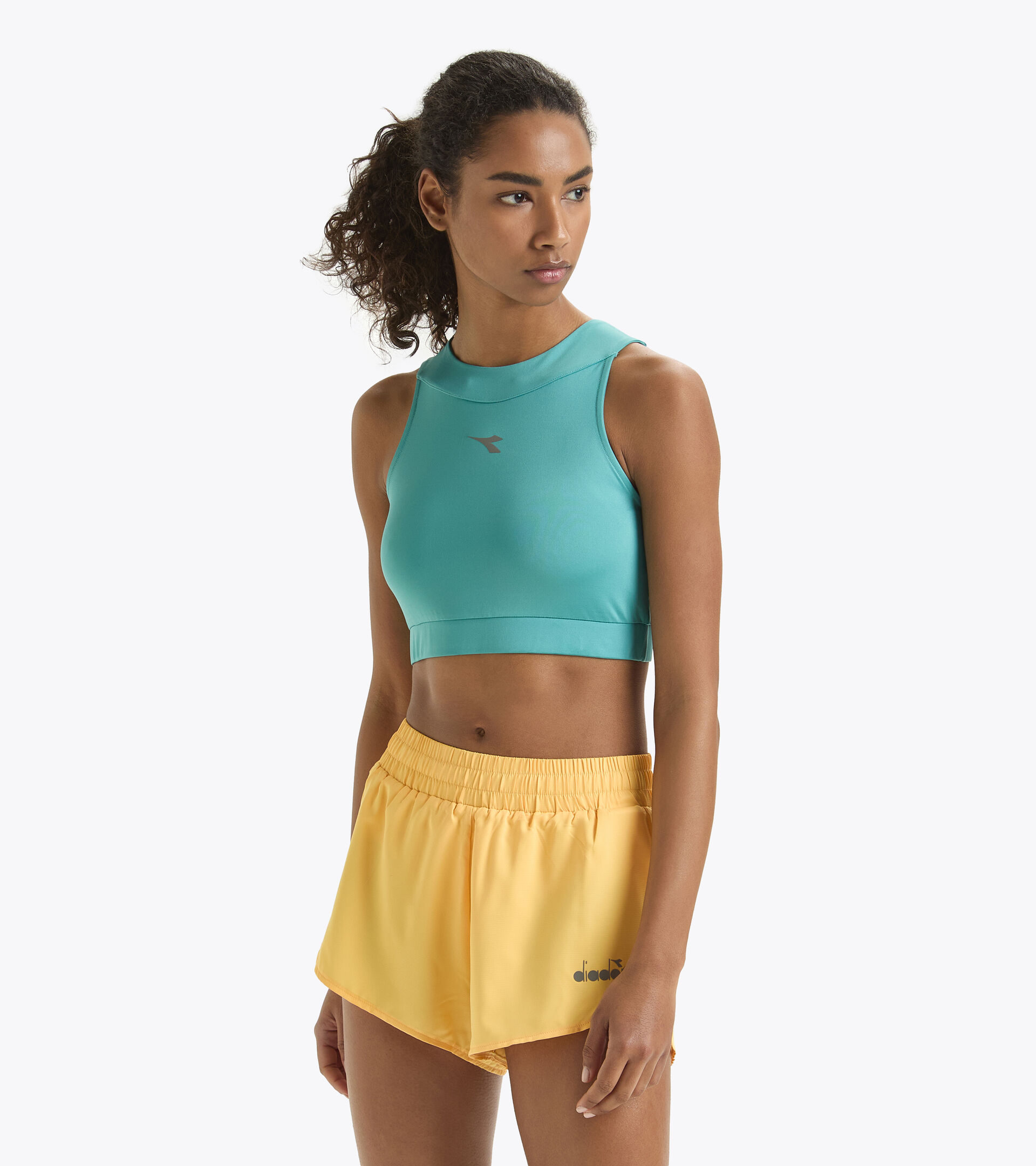 Top da running aderente - Donna
 L. CROP TOP RUN AZZURRO TURCHESE POLVERE - Diadora