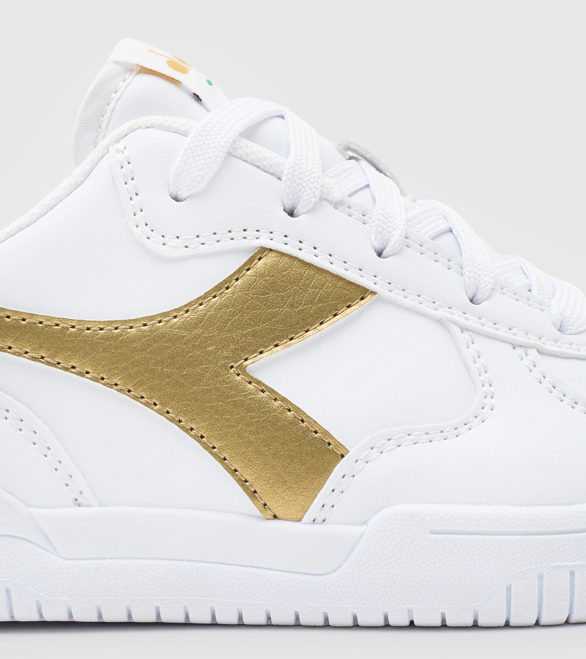 Sports shoes - Youth 8-16 years RAPTOR LOW GS WHITE/GOLD - Diadora