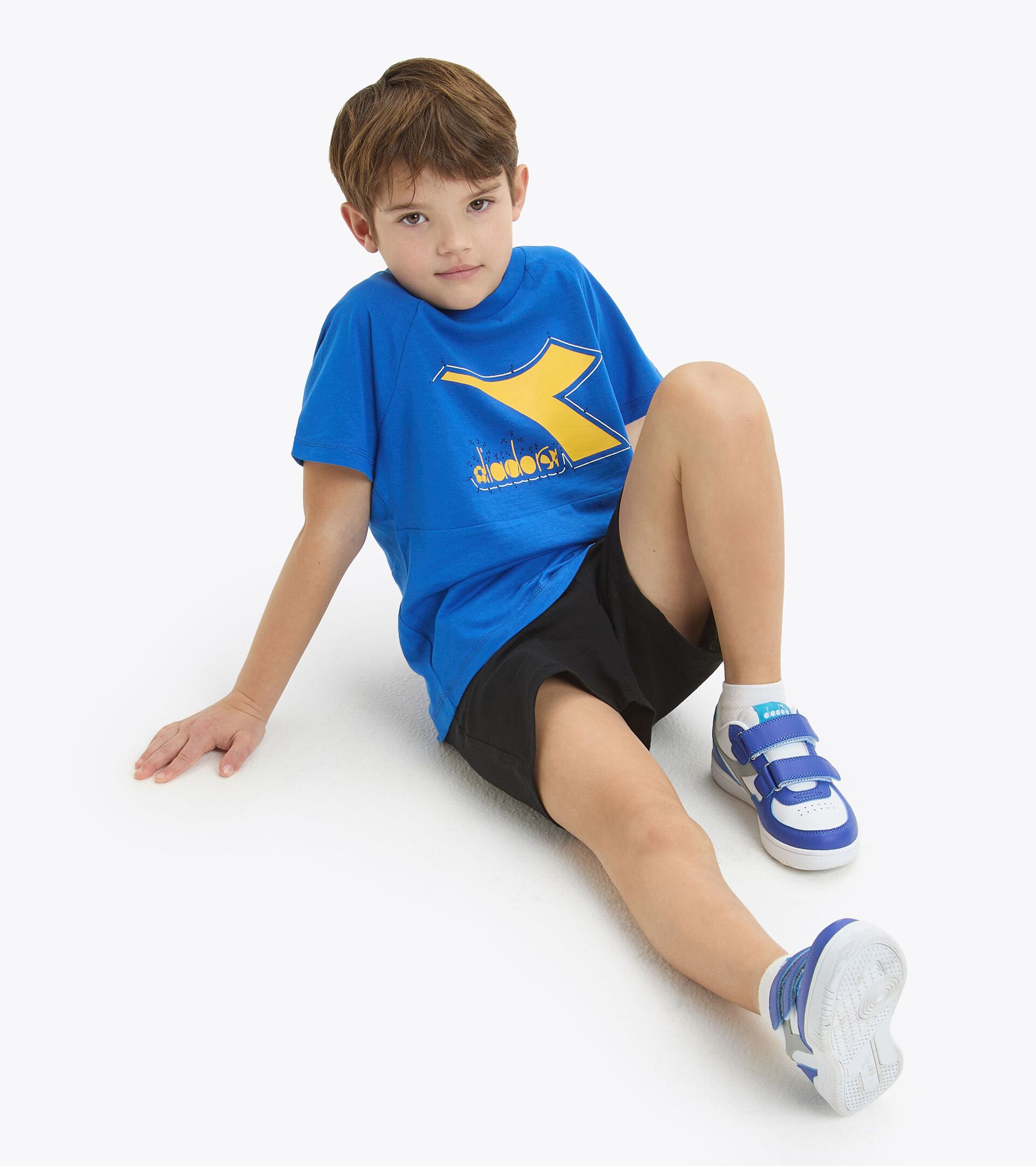 Sports set - T-shirt and shorts - Boy
 JB. SET SS RIDDLE PRINCESS BLUE - Diadora