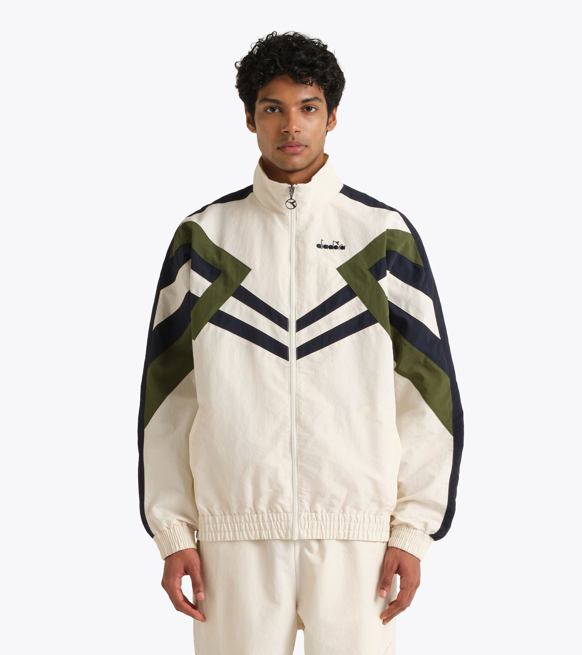 Track Jacket Legacy - Para todos los g&eacute;neros
 TRACK JACKET LEGACY ALYSSUM BLANCO - Diadora