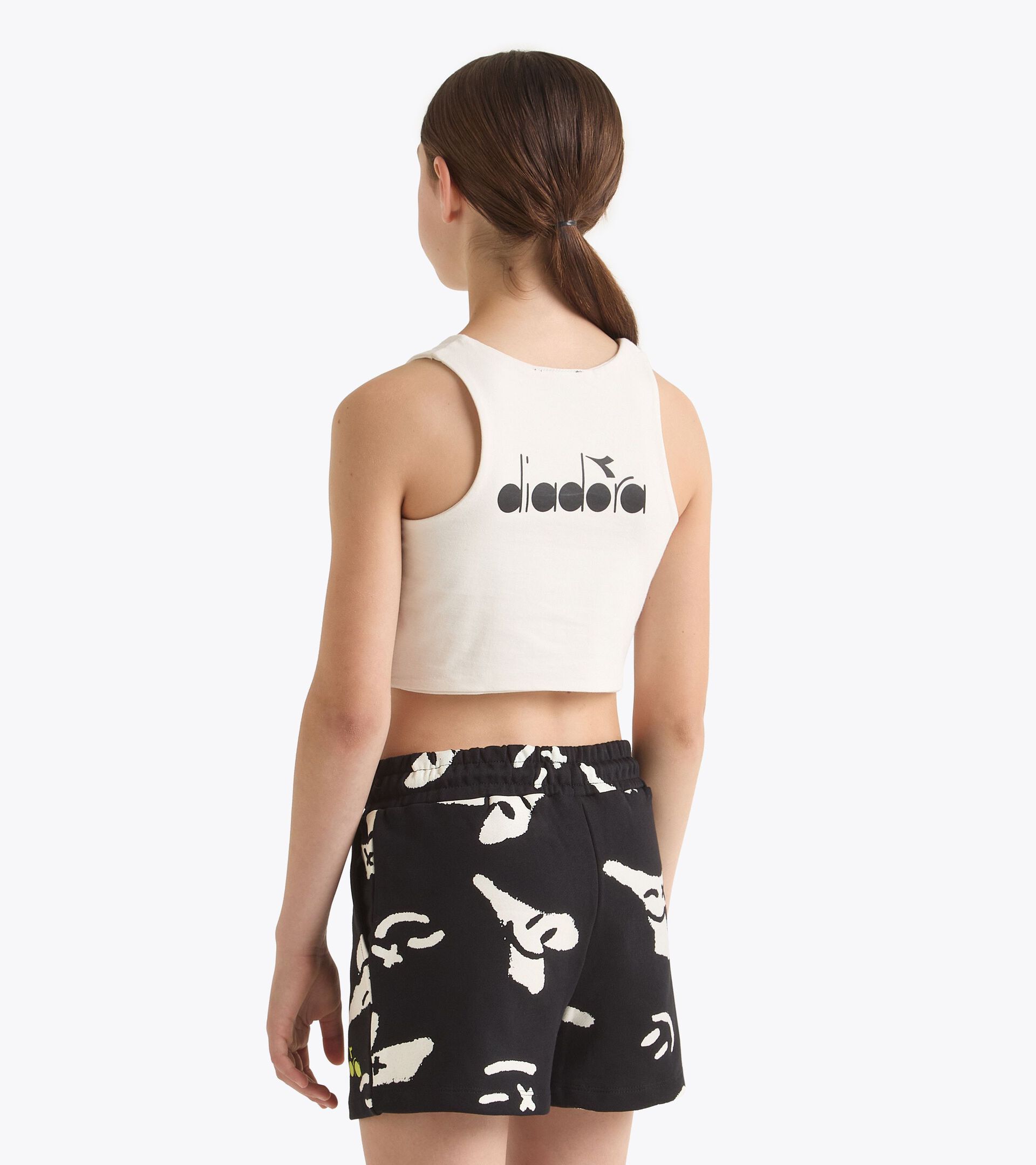 Cropped-T-Shirt mit Logo - Mädchen
JG. CROP TOP SMILE LOGO CREAM - Diadora