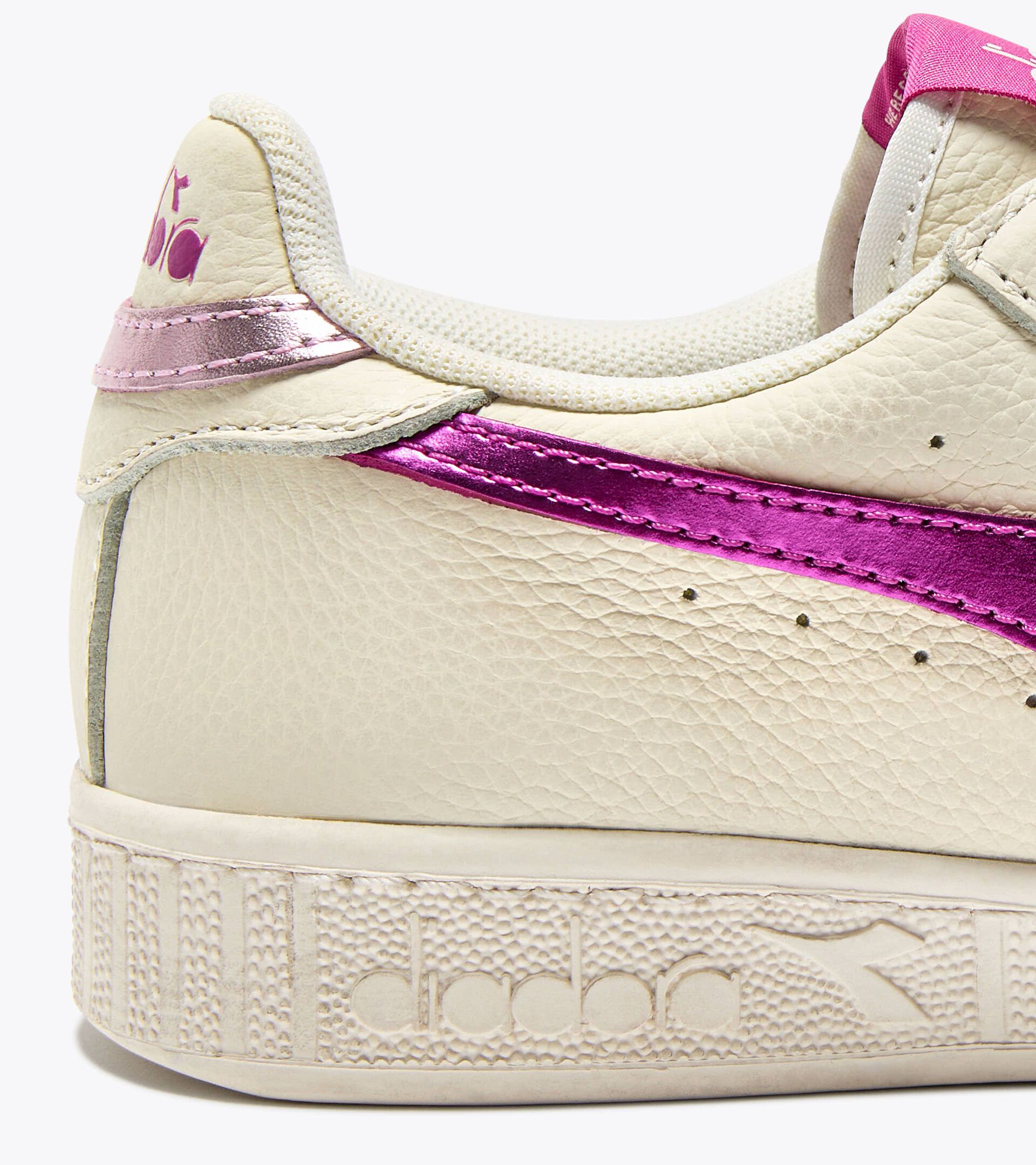 Leather sports sneakers - Women’s 
 GAME L LOW WAXED METAL WN WHITE/FESTIVAL FUCHSIA - Diadora