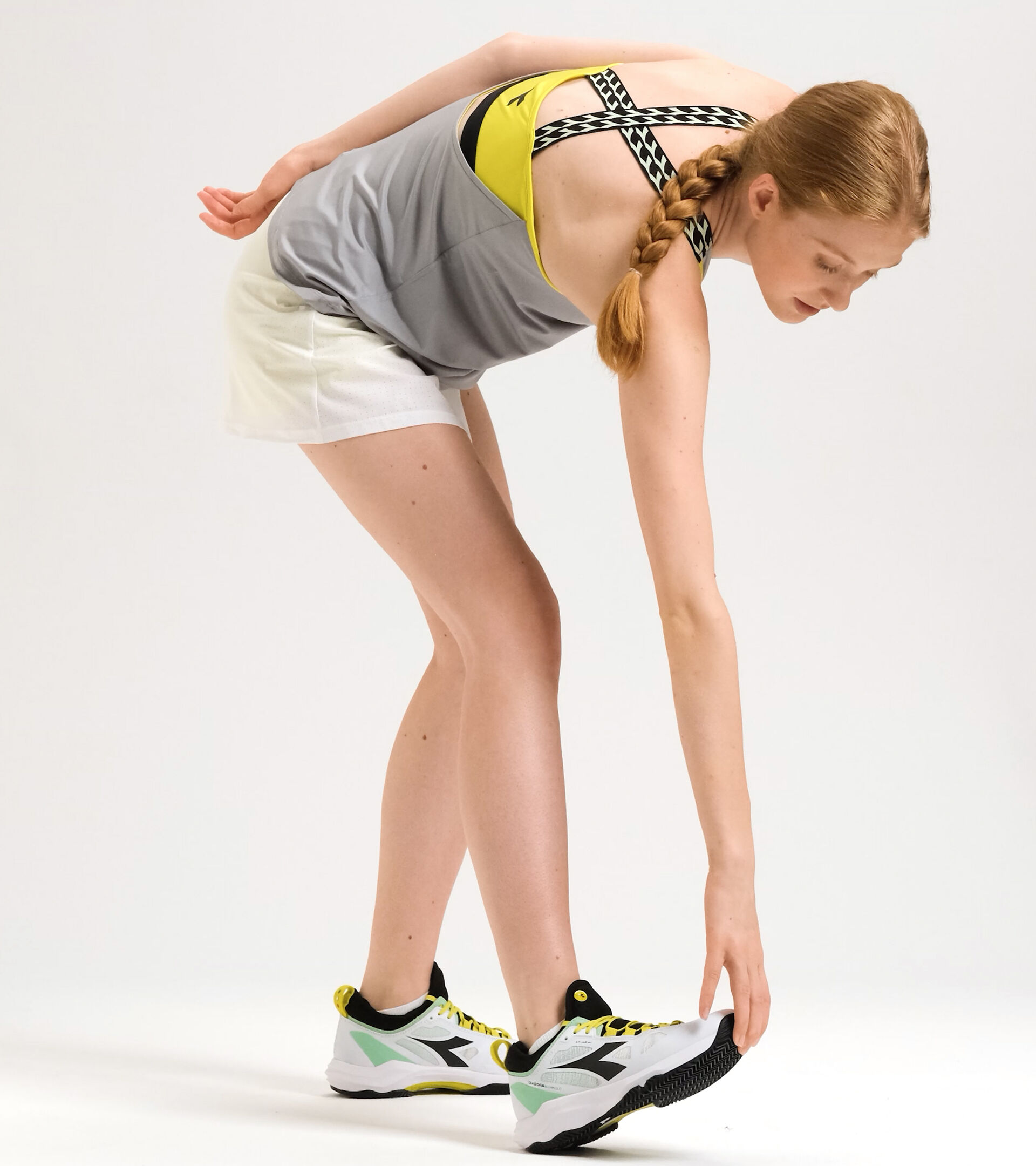 Apparel Sport DONNA L. SKIRT BLANCO VIVO Diadora