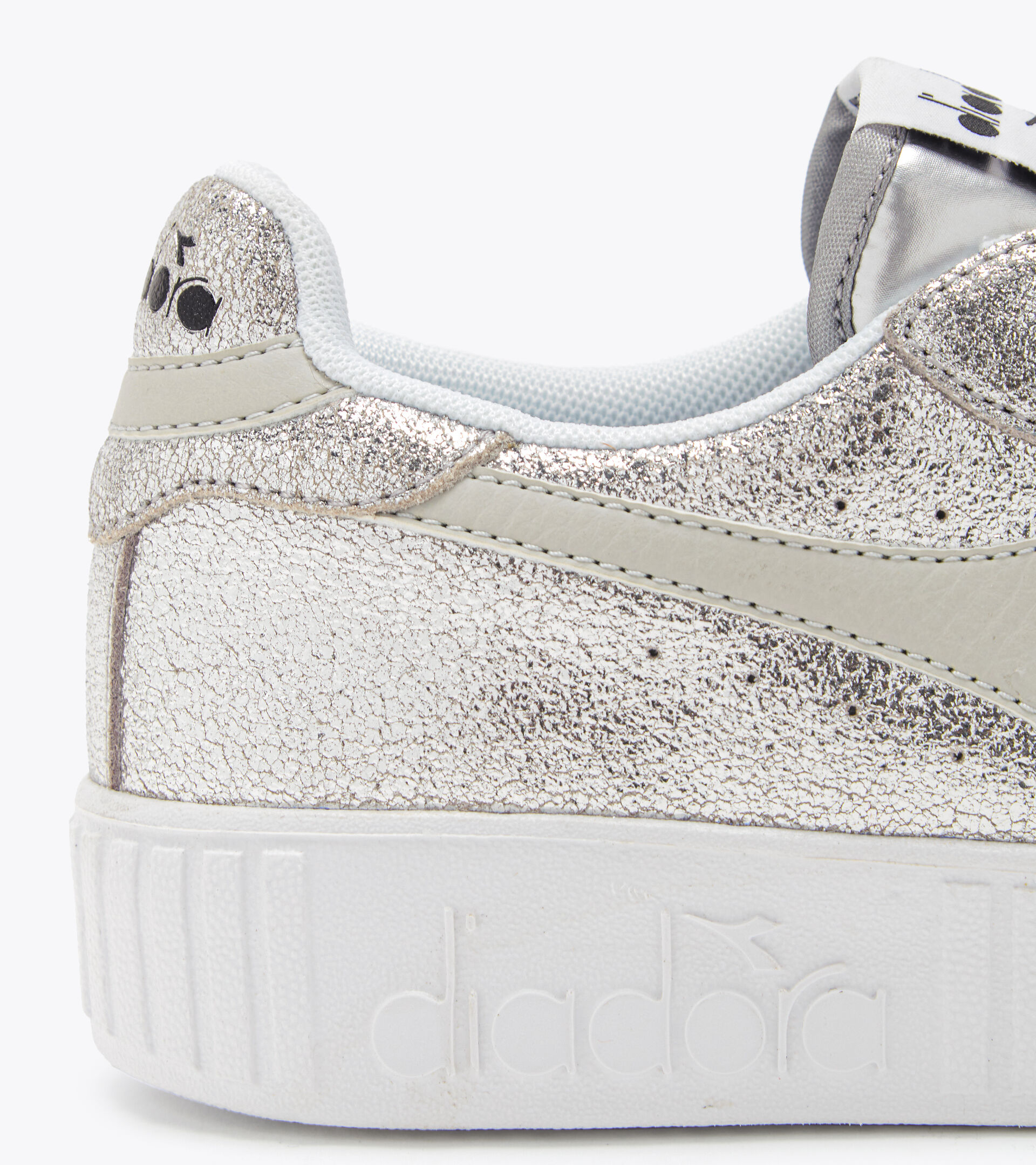 Sports shoes - Women
GAME STEP PREMIUM METAL WHITE/SILVER - Diadora