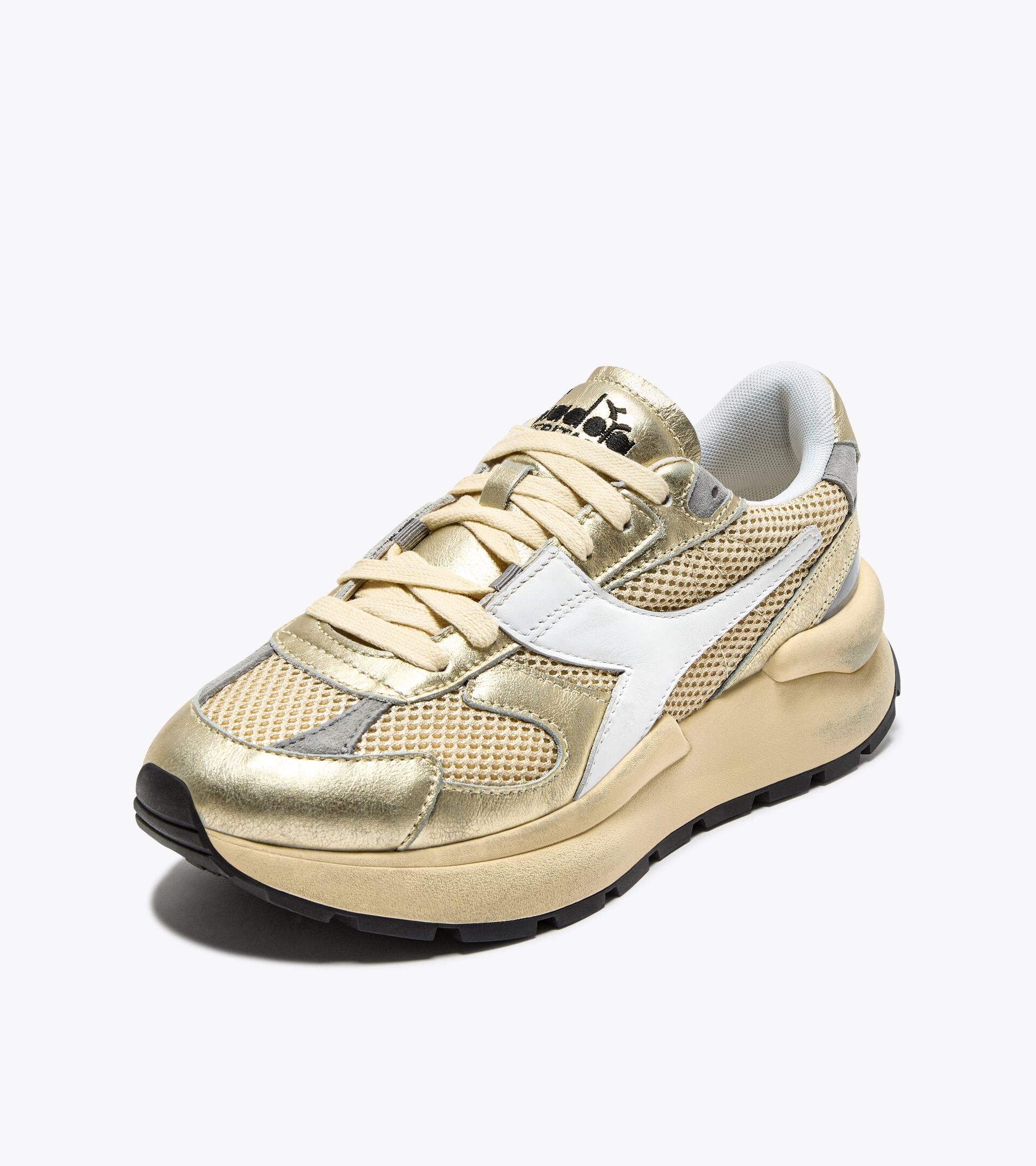 Zapatilla Heritage de piel laminada - Mujer
 MERCURY ELITE LAM USED  WN MANZANILLA - Diadora