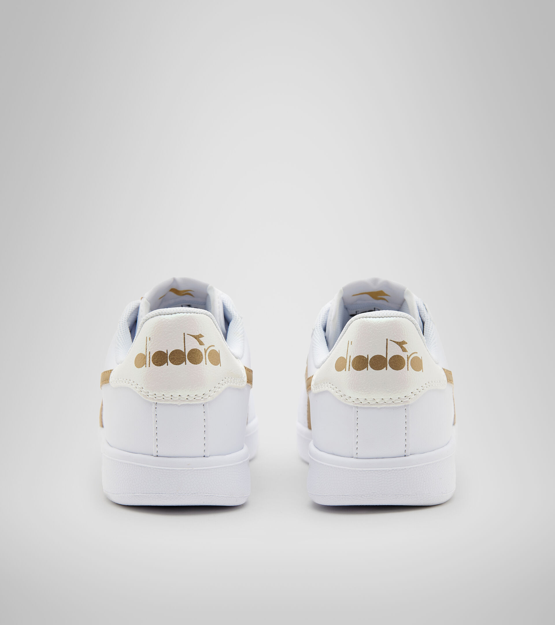 Sports shoes - Youth 8-16 years GAME P GS GIRL WHITE/GOLD - Diadora