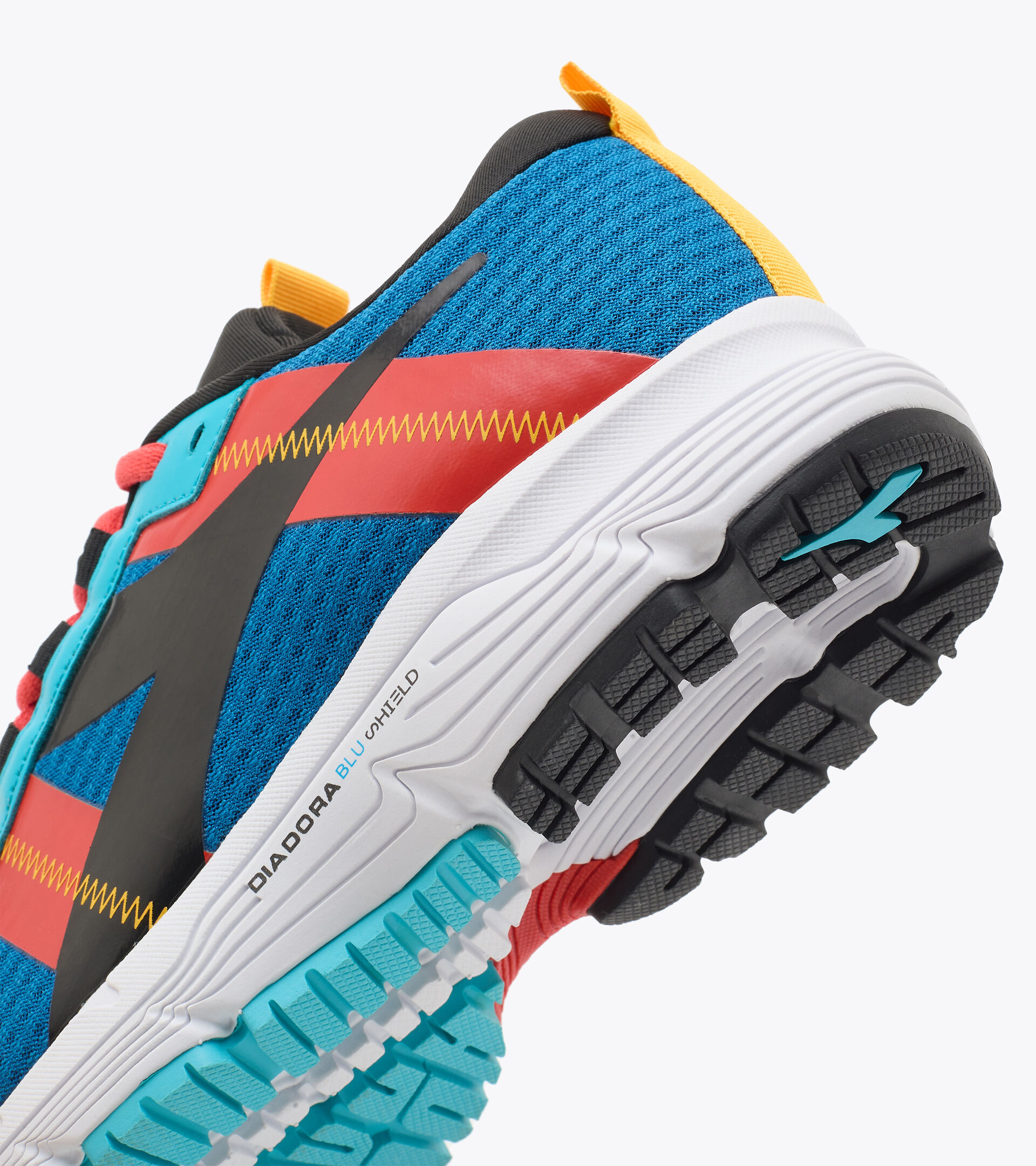 Footwear Sport BAMBINO MYTHOS BLUSHIELD ELITE 4 Y BLU MYKONOS/NERO/ROSSO FIESTA Diadora