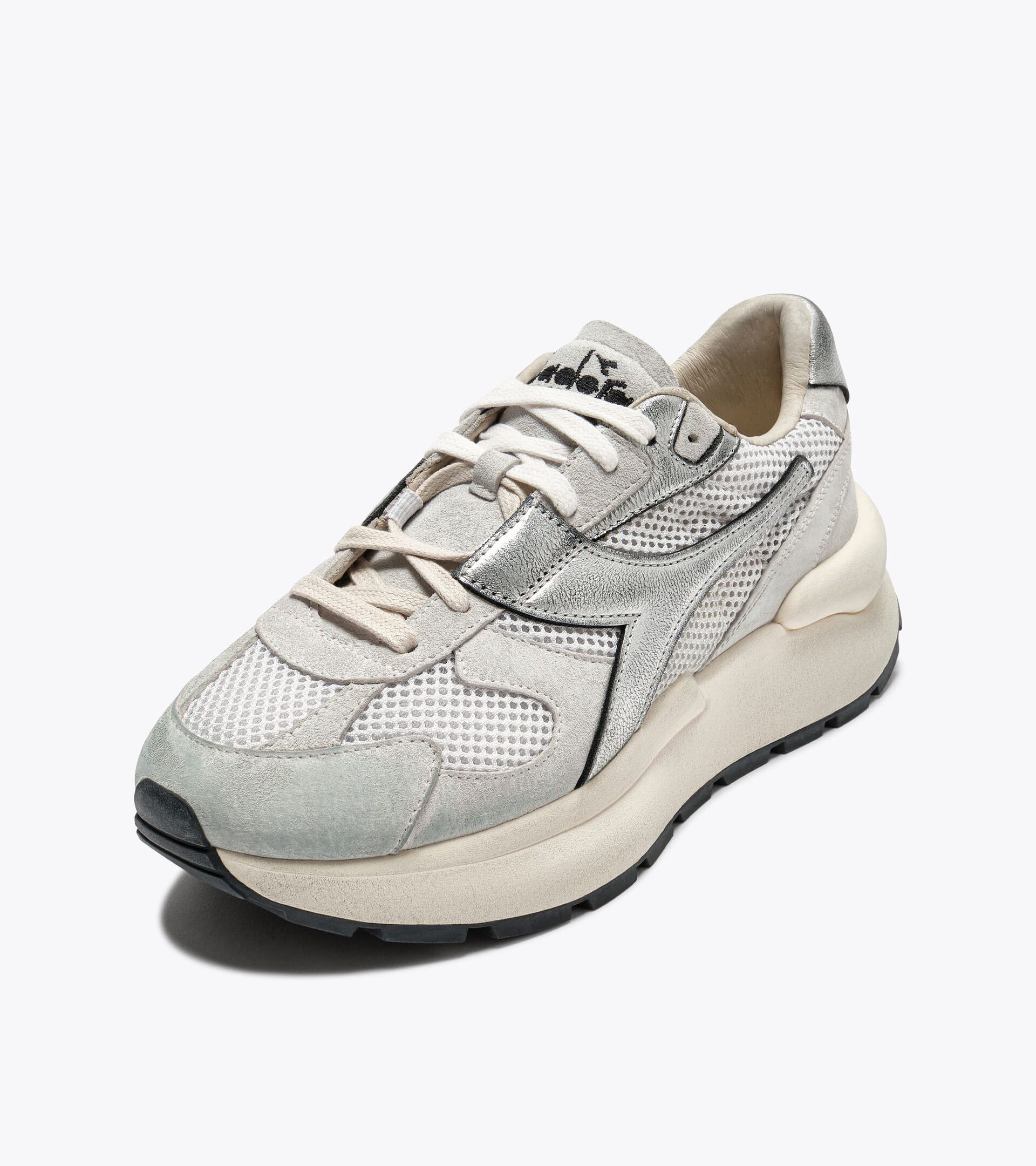 Zapatilla Heritage de piel y malla  - Mujer
 MERCURY ELITE METAL USED WN BLANCO - Diadora