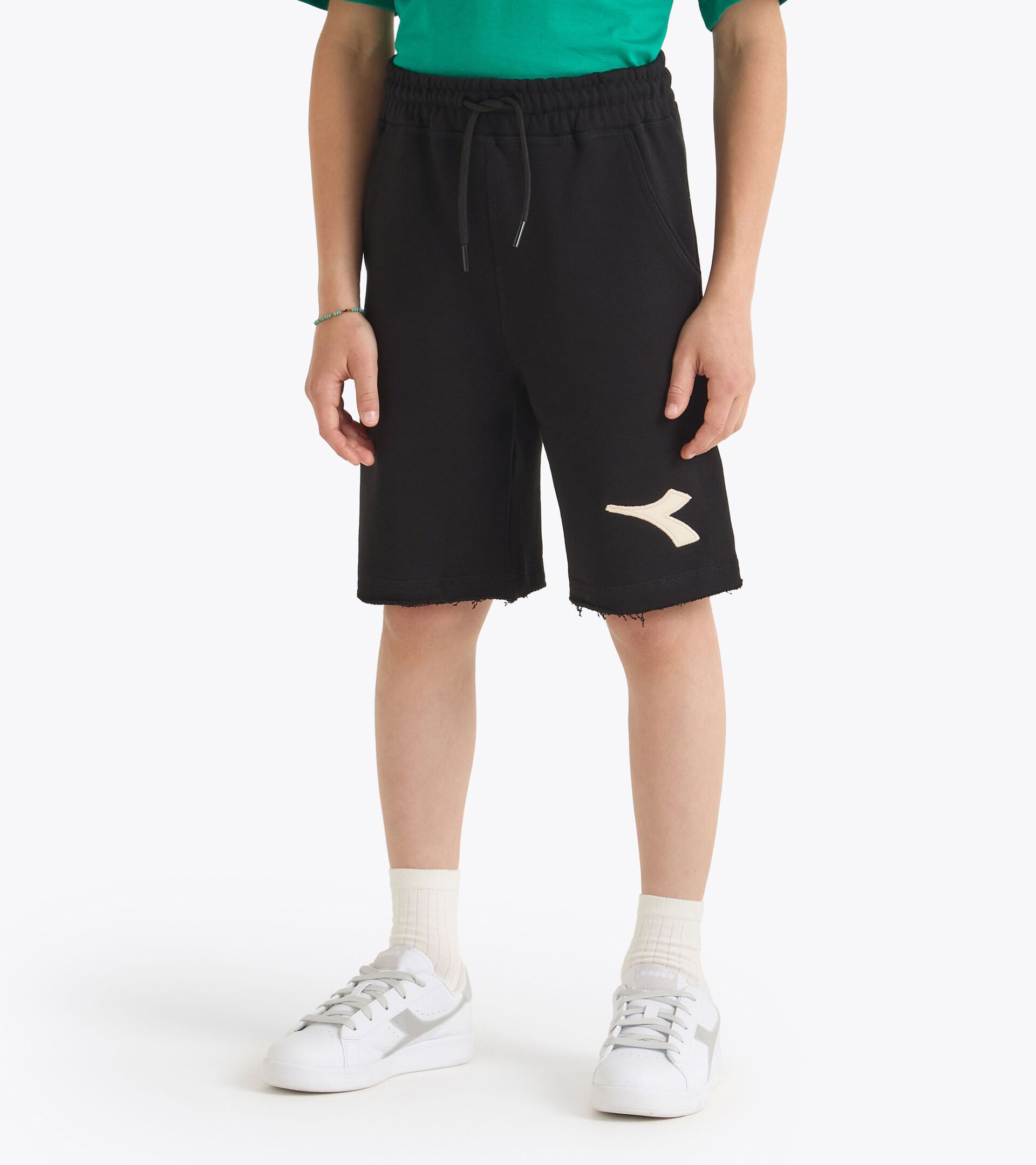 Bermudas - Corte cómodo - Niño
JB. BERMUDA DISTRICT NEGRO - Diadora