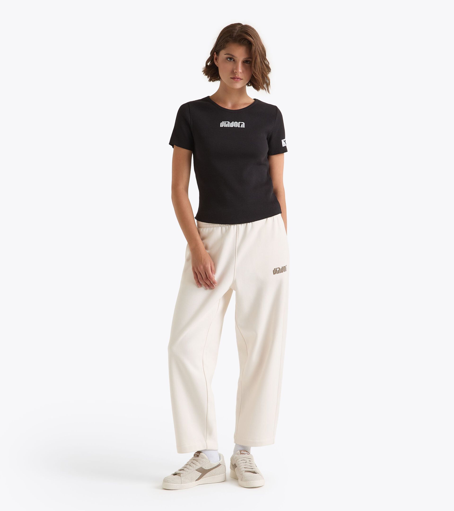 Pantalón deportivo - Mujer
 L. PANTS ATHL. LOGO BLANCO MURMURAR - Diadora