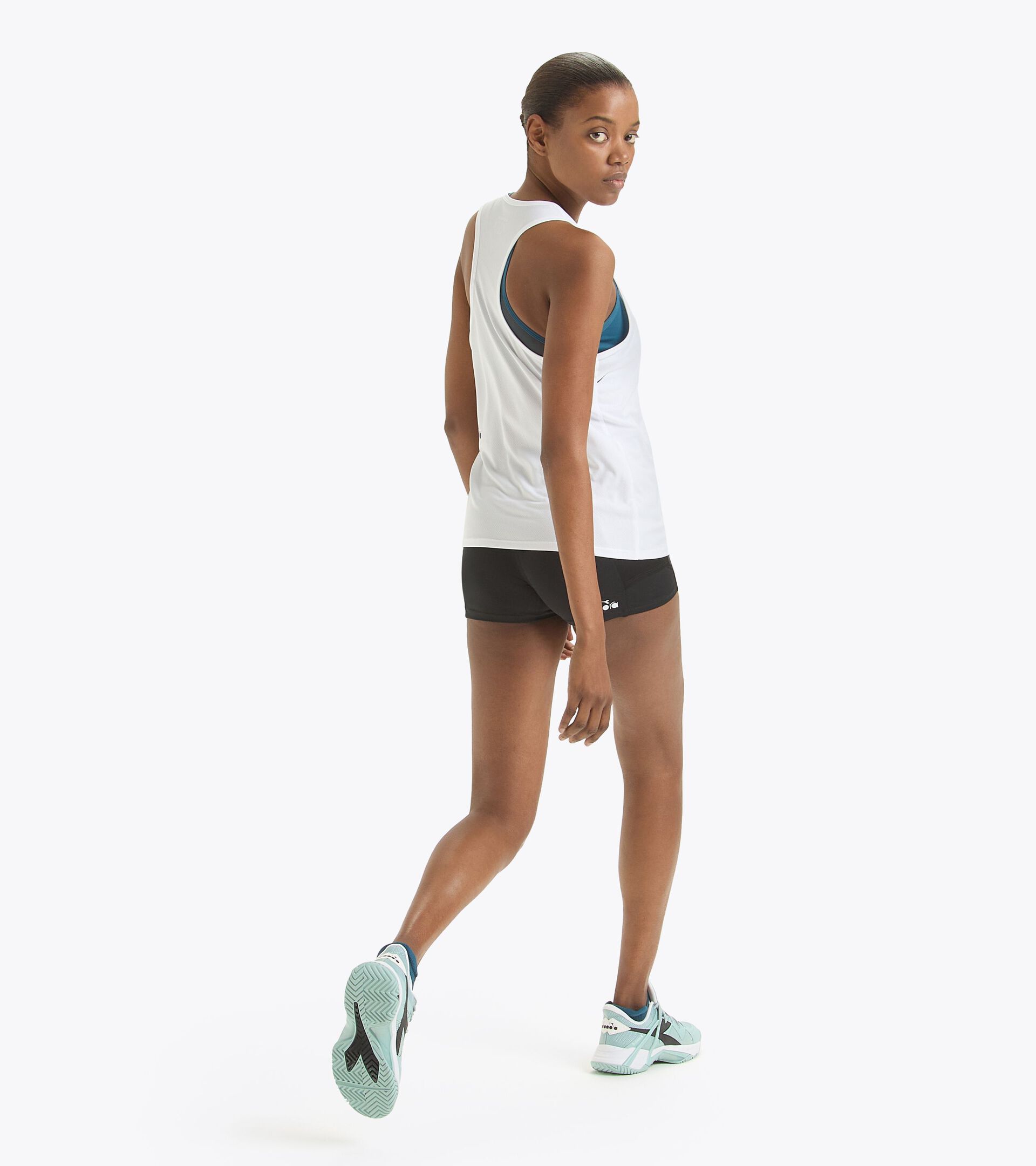 Pantalones cortos de tenis - Mujer
 L. SHORT TIGHTS POCKETS NEGRO - Diadora