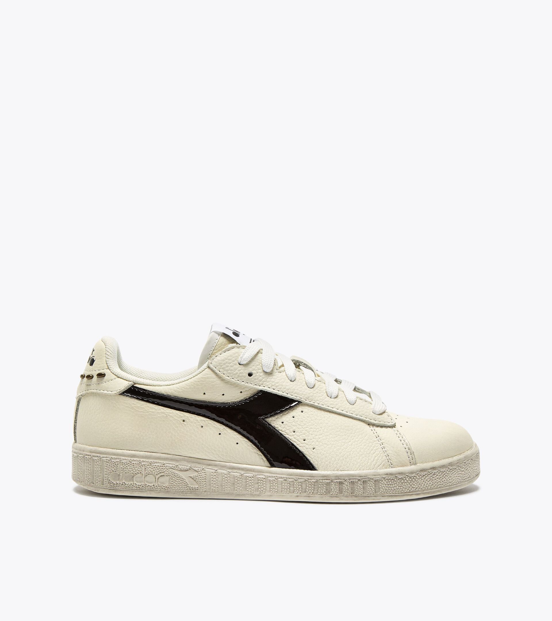Sneaker sportiva in pelle - Donna 
 GAME L LOW WAXED STUDS WN BIANCO/NERO - Diadora