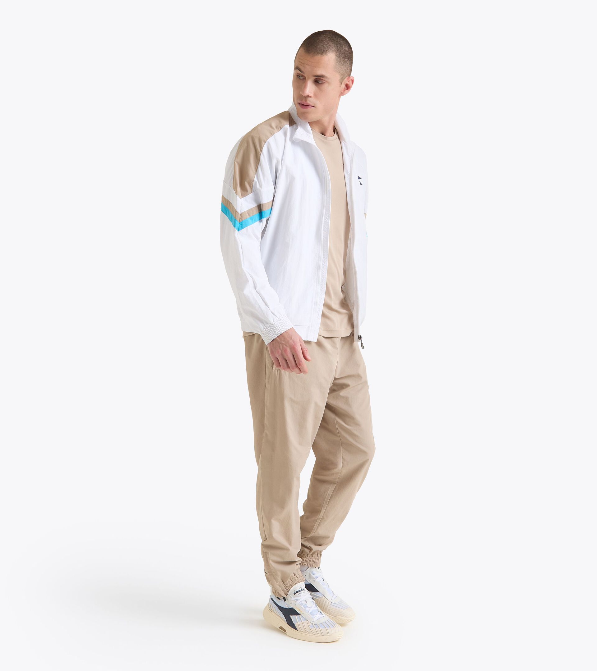 Surv&ecirc;tement de tennis en taslan - Comp&eacute;tition - Pour tous les genres U. TRACK PANTS MATCH BEIGE HOUMMOS - Diadora