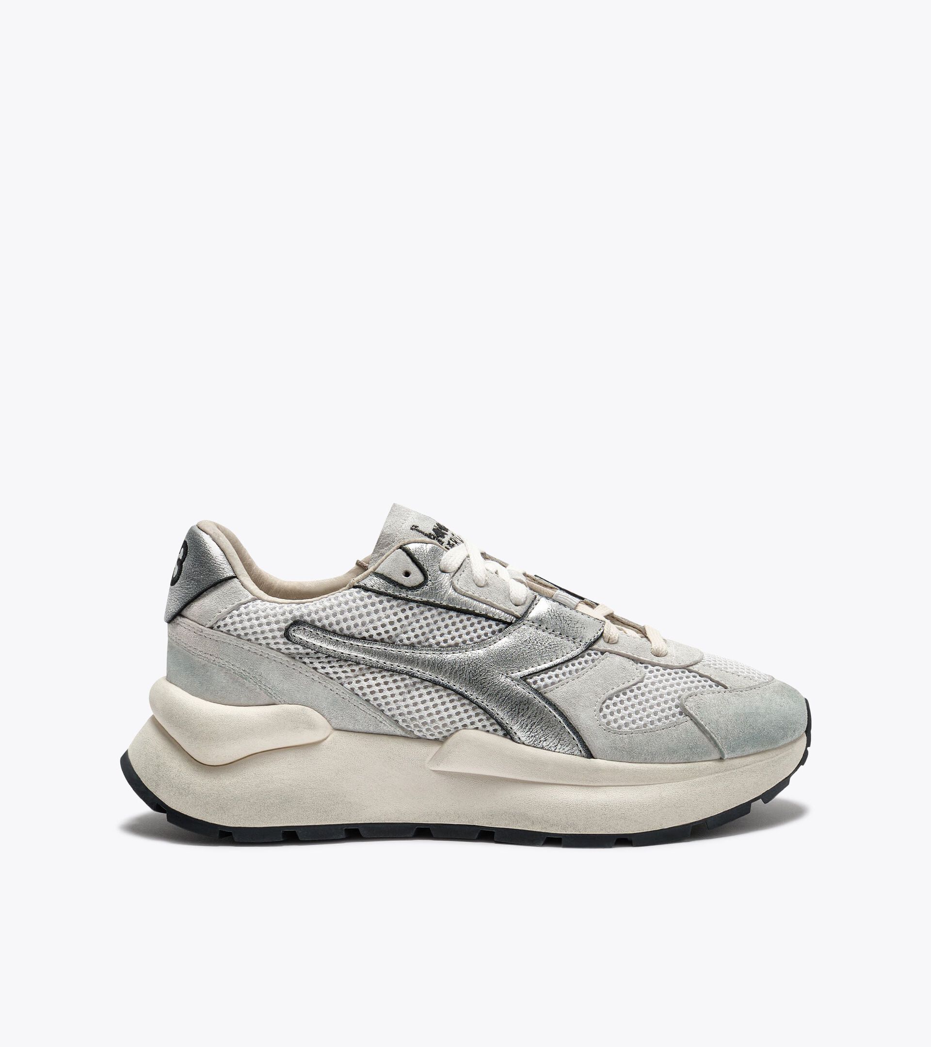 Zapatilla Heritage de piel y malla  - Mujer
 MERCURY ELITE METAL USED WN BLANCO - Diadora