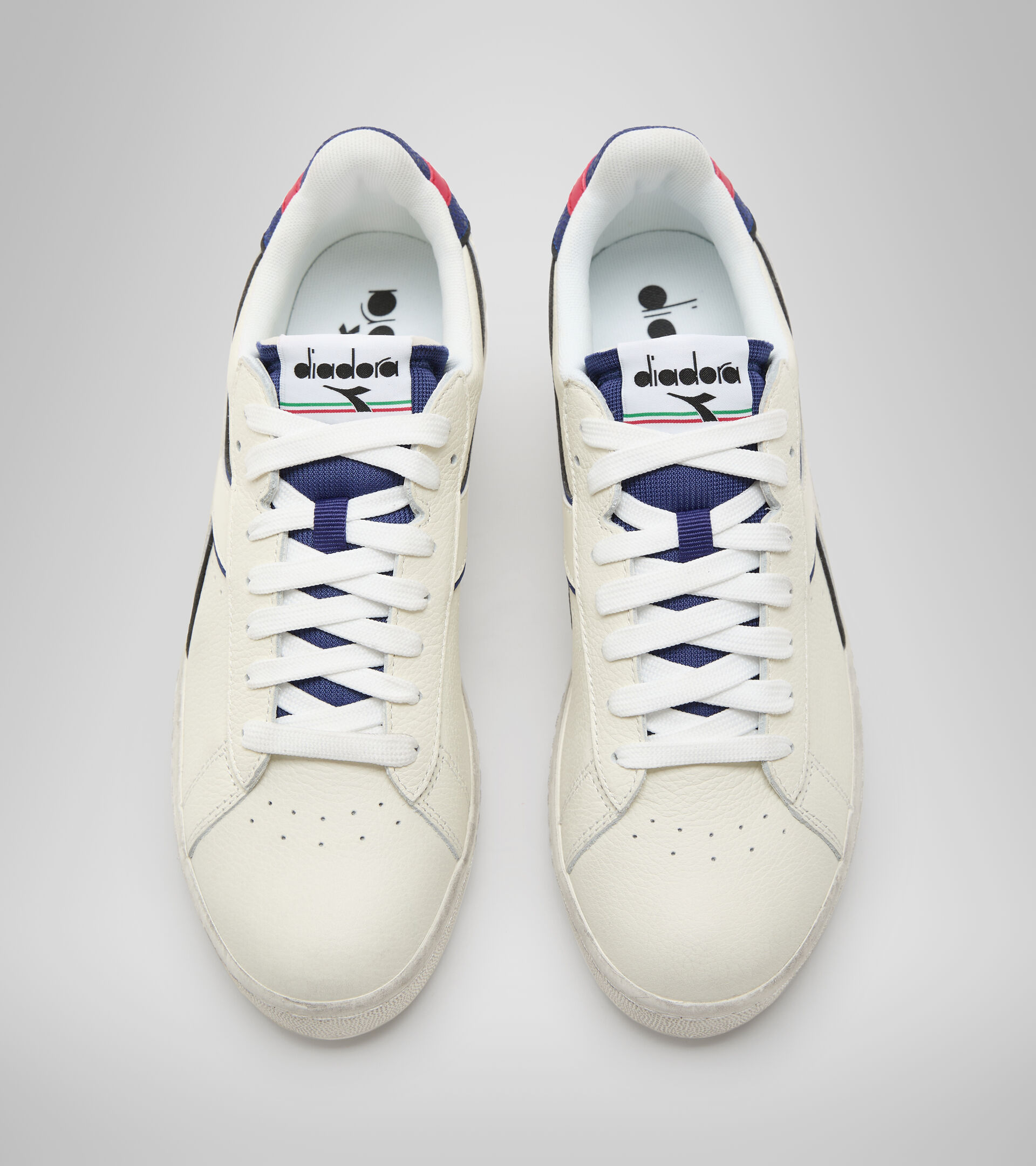 Sports shoe - Unisex GAME L LOW ICONA WHITE/BLUE PRINT - Diadora