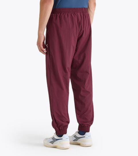 U. TRACK PANTS MATCH, ROJO BANDERA Chándal de tenis de taslán - Competición - Para todos los géneros U. TRACK PANTS MATCH ROJO BANDERA - Diadora