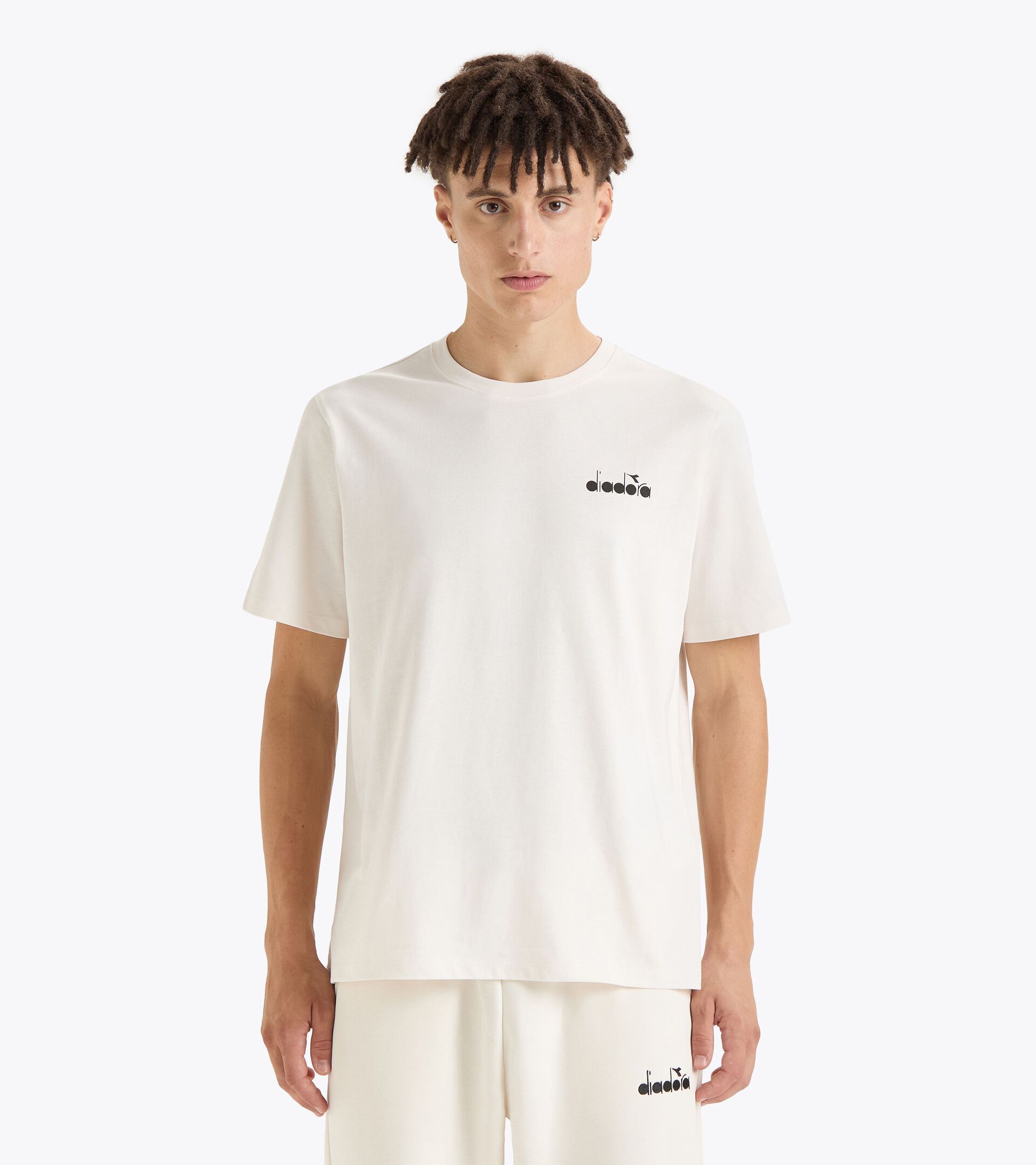 Sportliches T-Shirt mit kurzen Ärmeln - alle Geschlechter
 T-SHIRT SS ROUTE WEISS LAPPENBLUME - Diadora